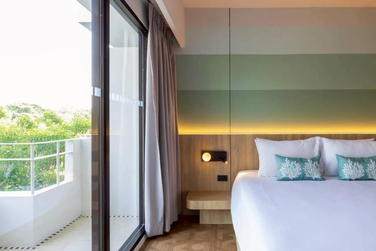 Bed in Garden Sea View Resort