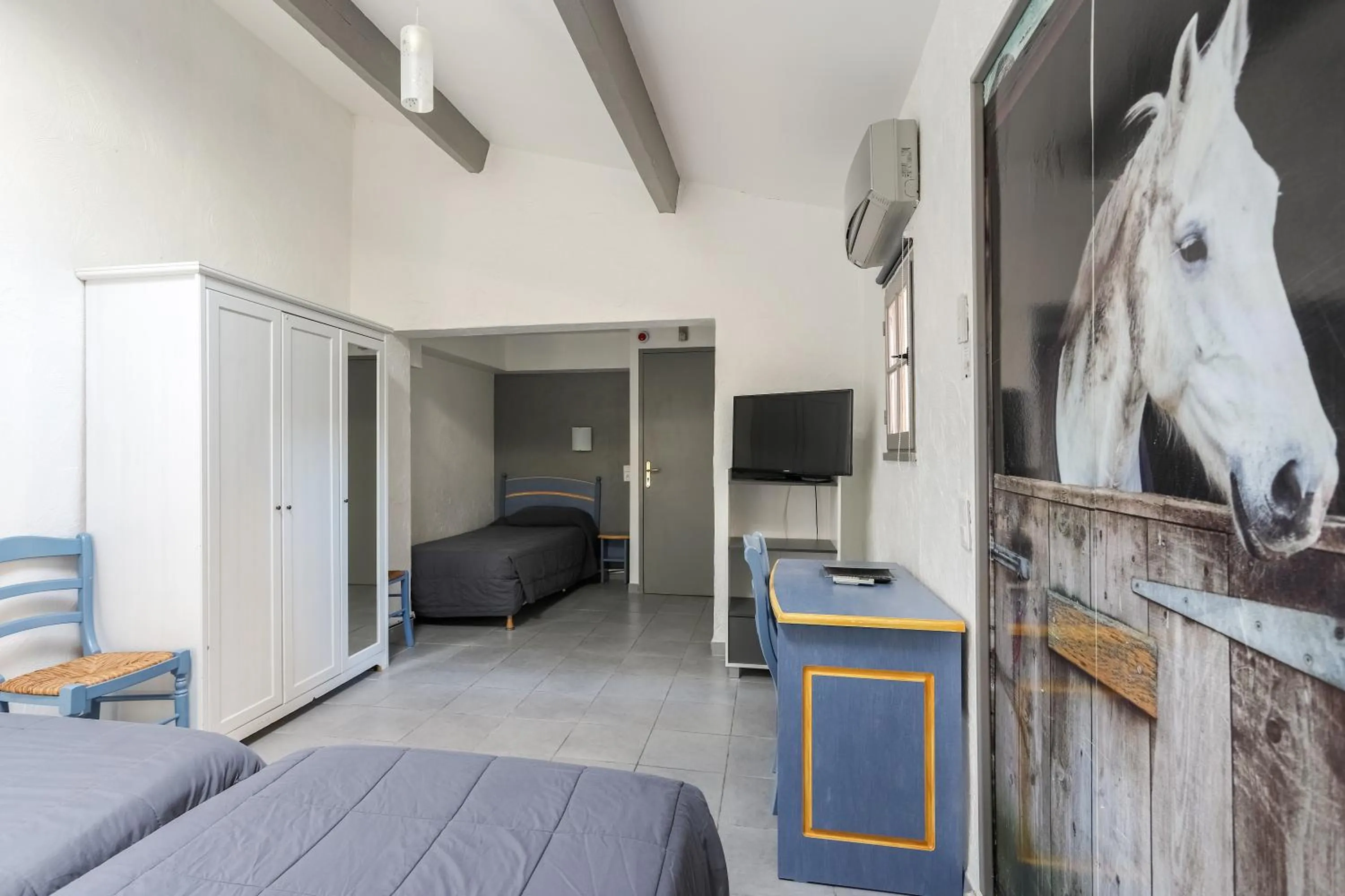 Photo of the whole room, Bed in Hotel Les Palmiers En Camargue