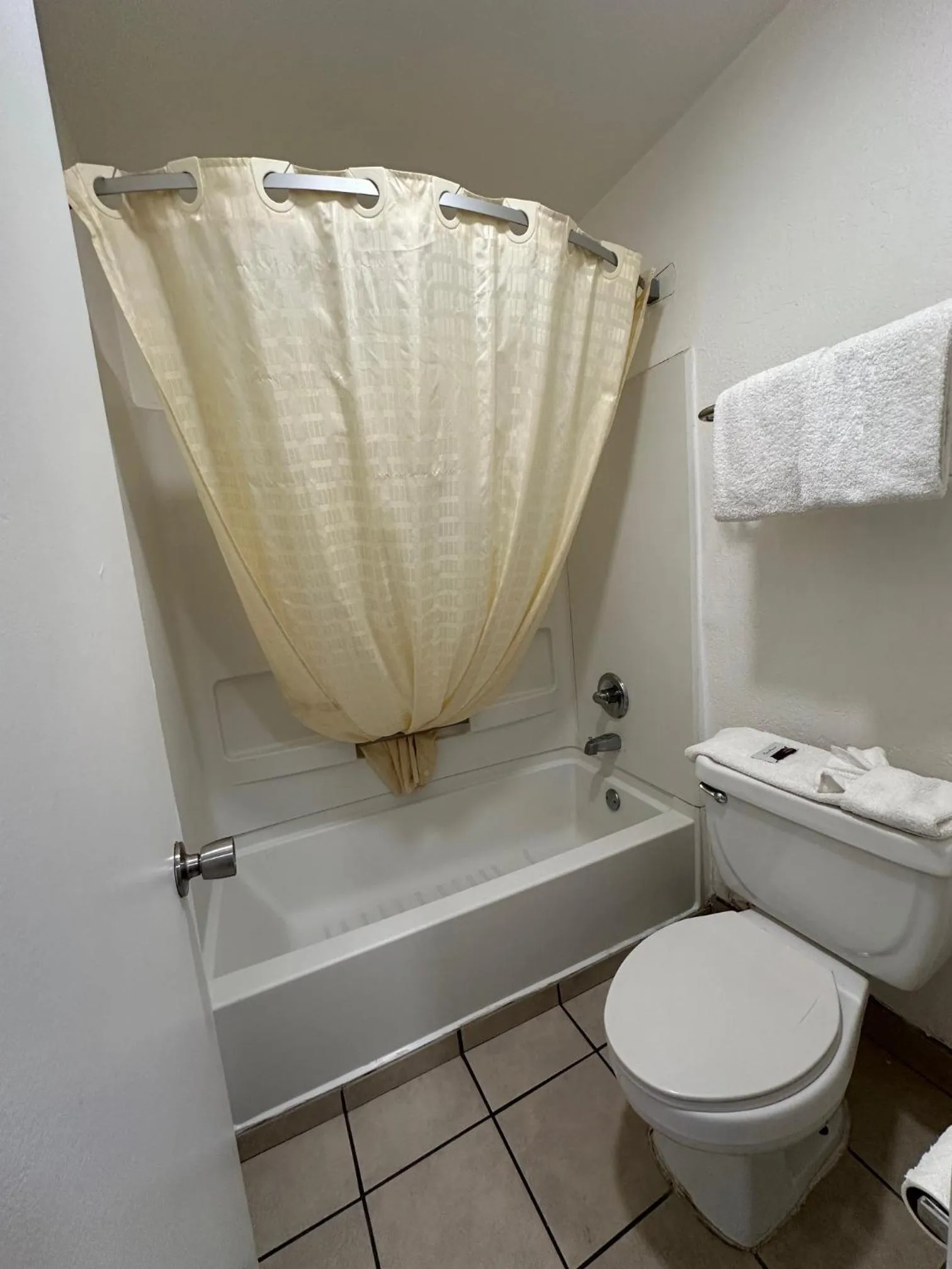 Toilet in Desert Sands Inn & Suites