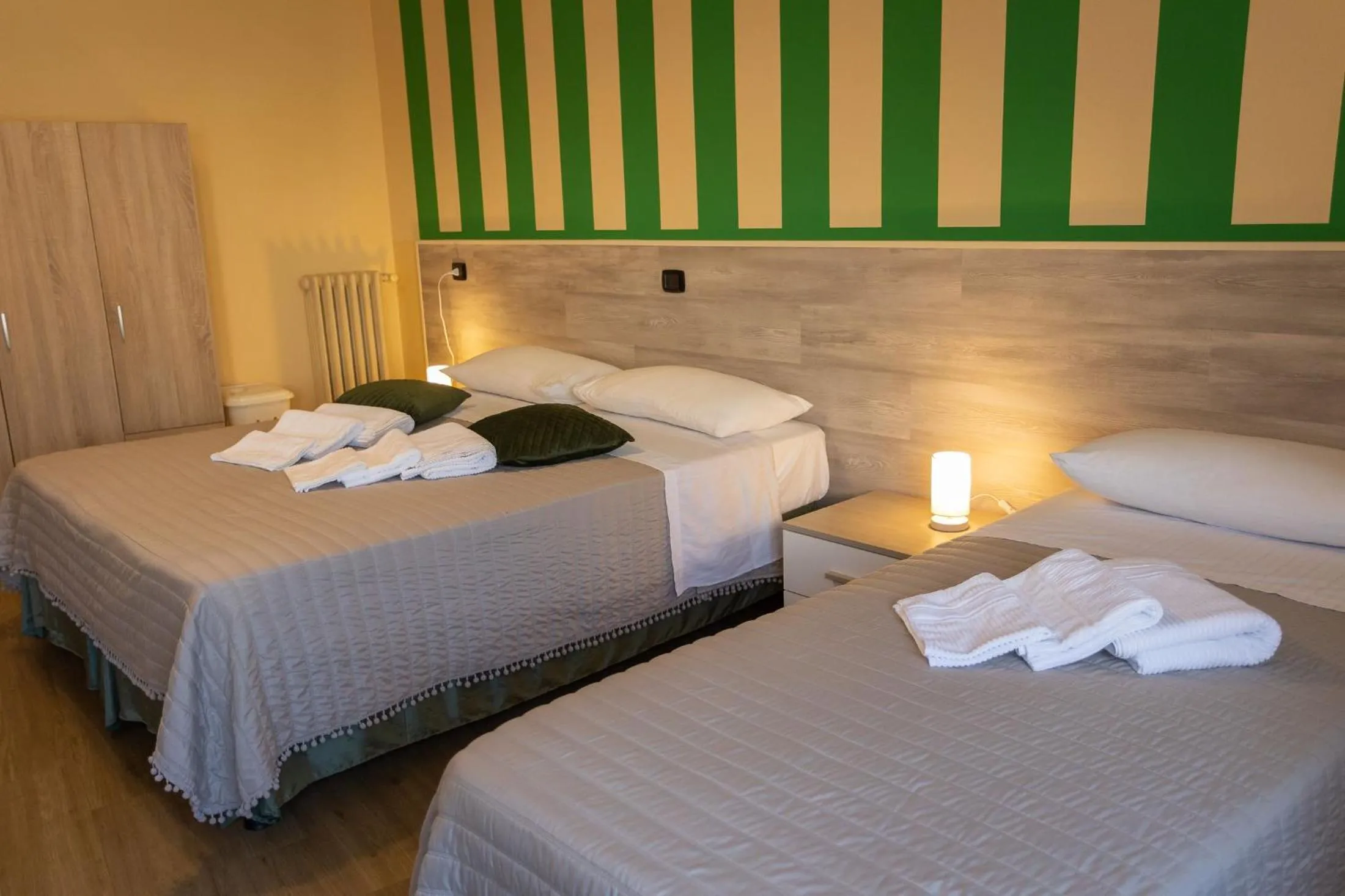 Bed in L'OPERA ROOMS