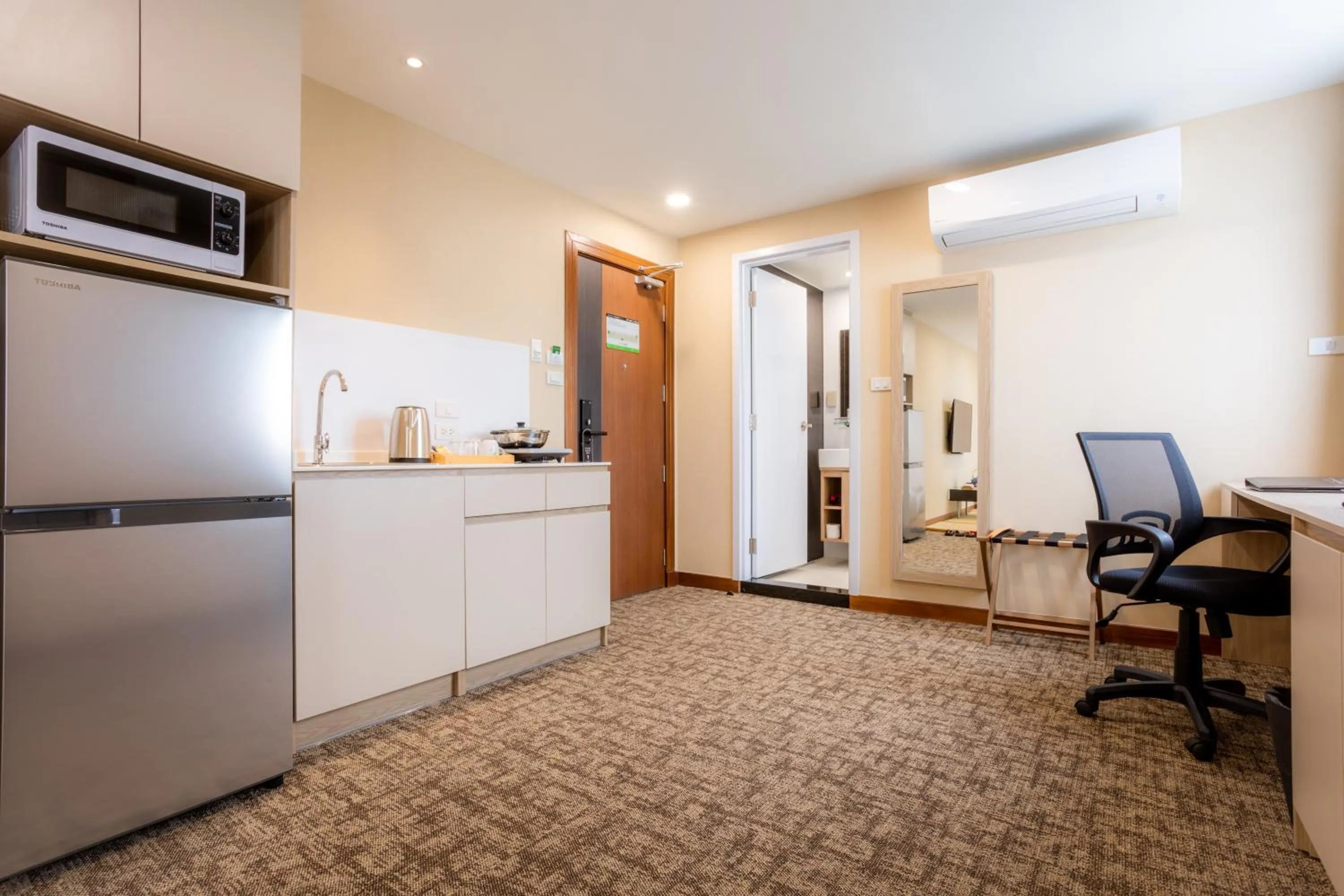 Kitchen or kitchenette in Hotel Kuretakeso Thailand Sriracha - SHA Extra Plus