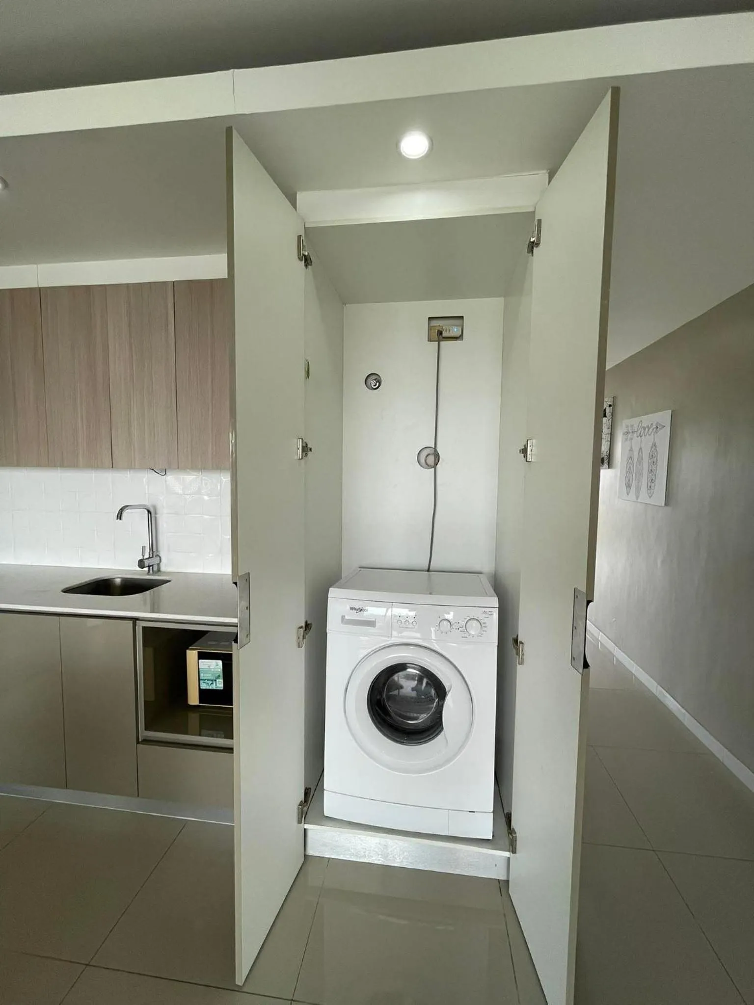 washing machine in Chequers Suites Subic Bay