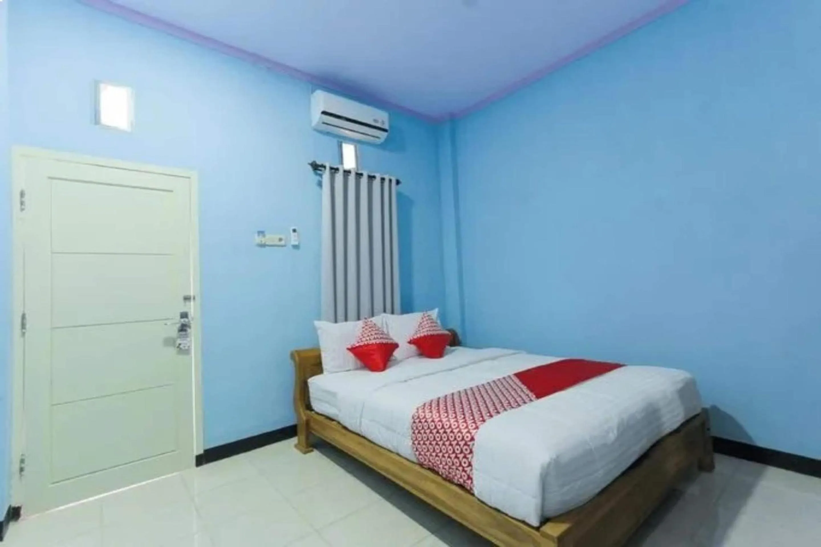 Bedroom in Hotel O Asipra House