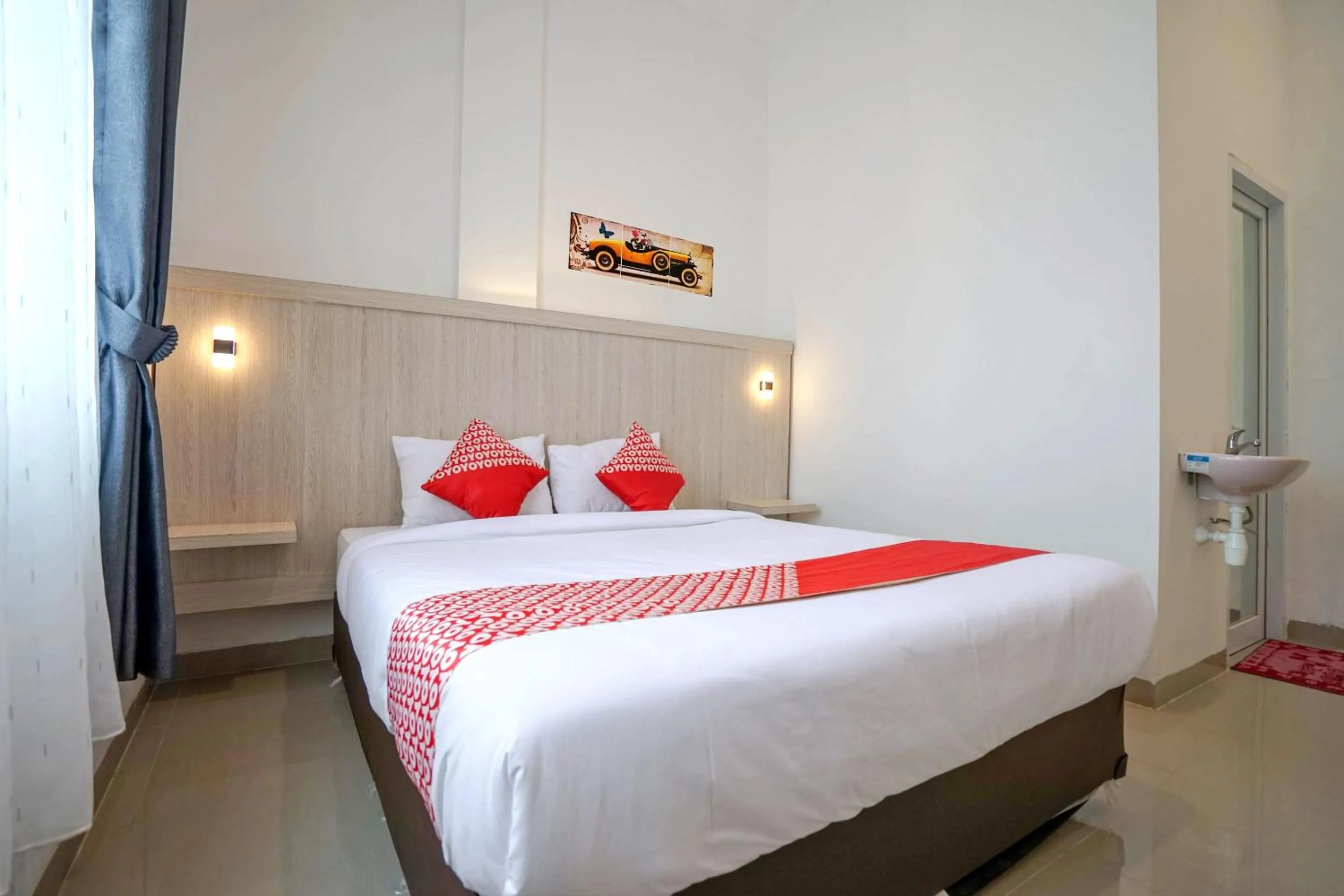 Bedroom in OYO Life 1299 Balcony Orange Homestay