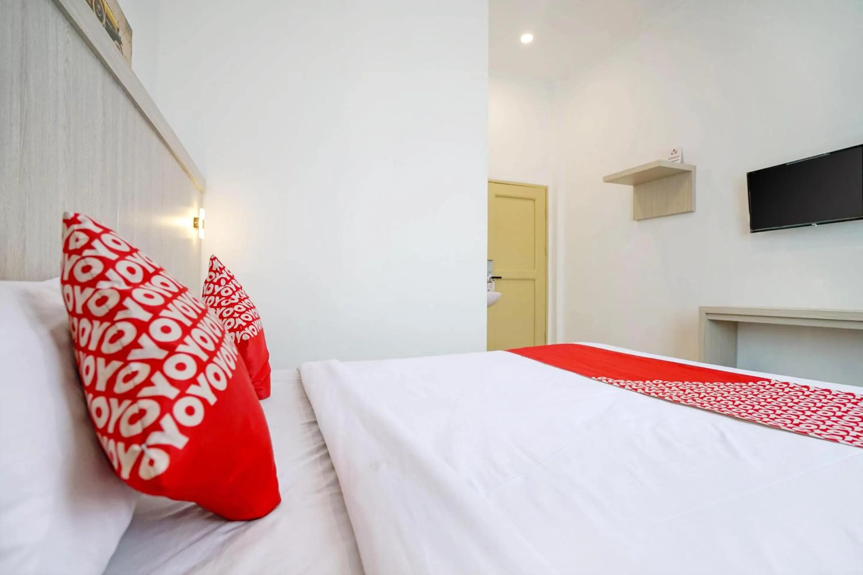 Bedroom in OYO Life 1299 Balcony Orange Homestay