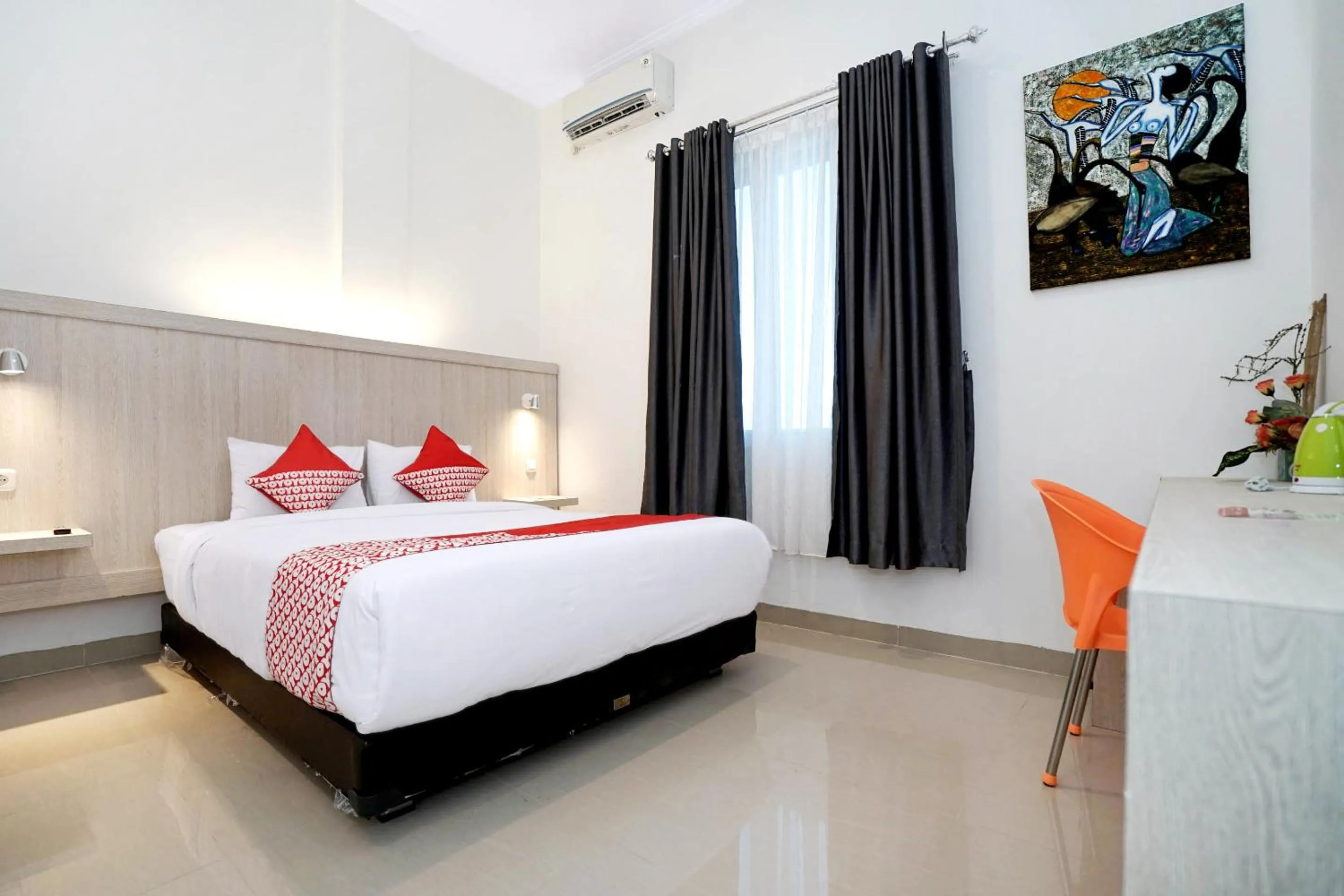 Bedroom in OYO Life 1299 Balcony Orange Homestay