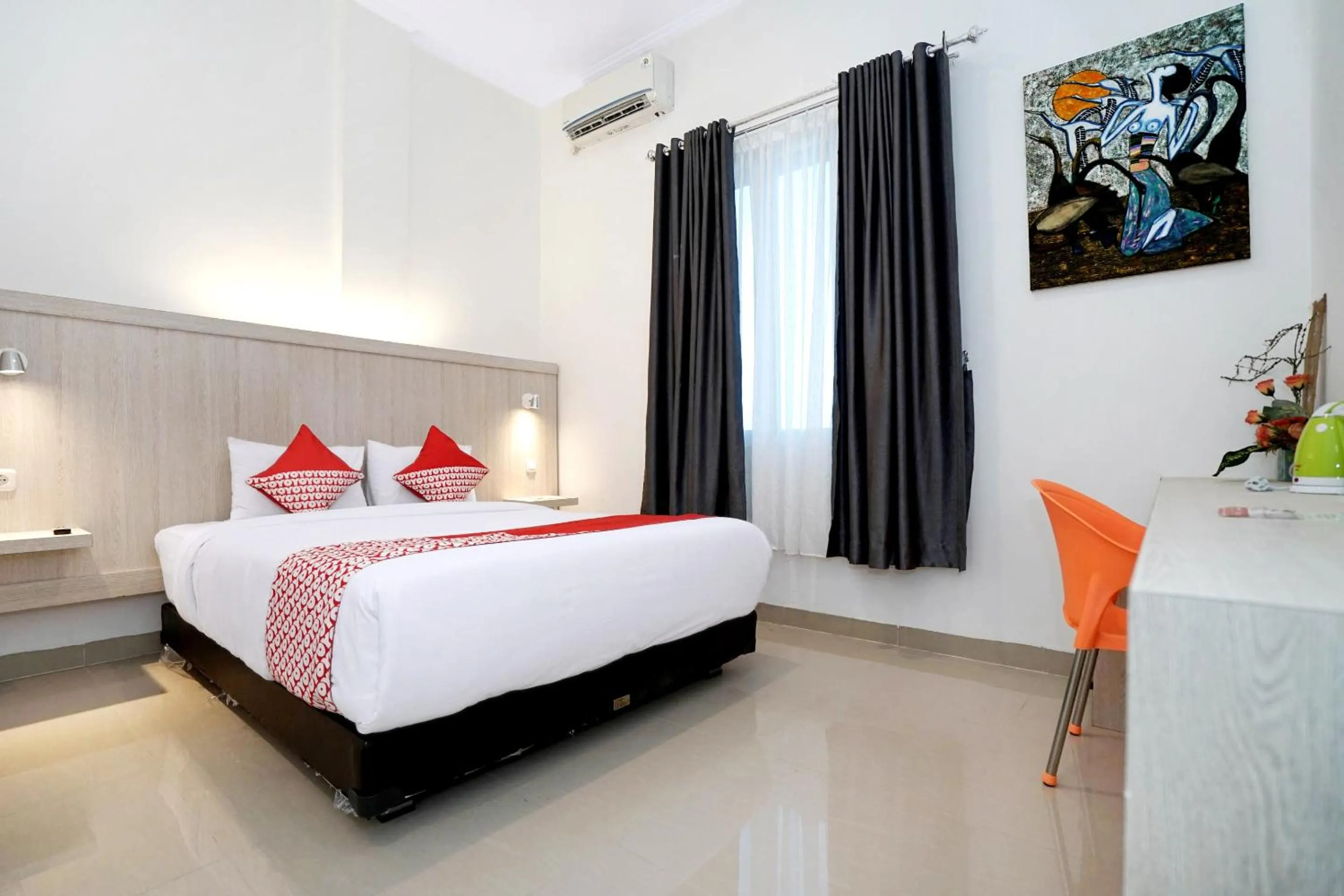 Bedroom in OYO Life 1299 Balcony Orange Homestay