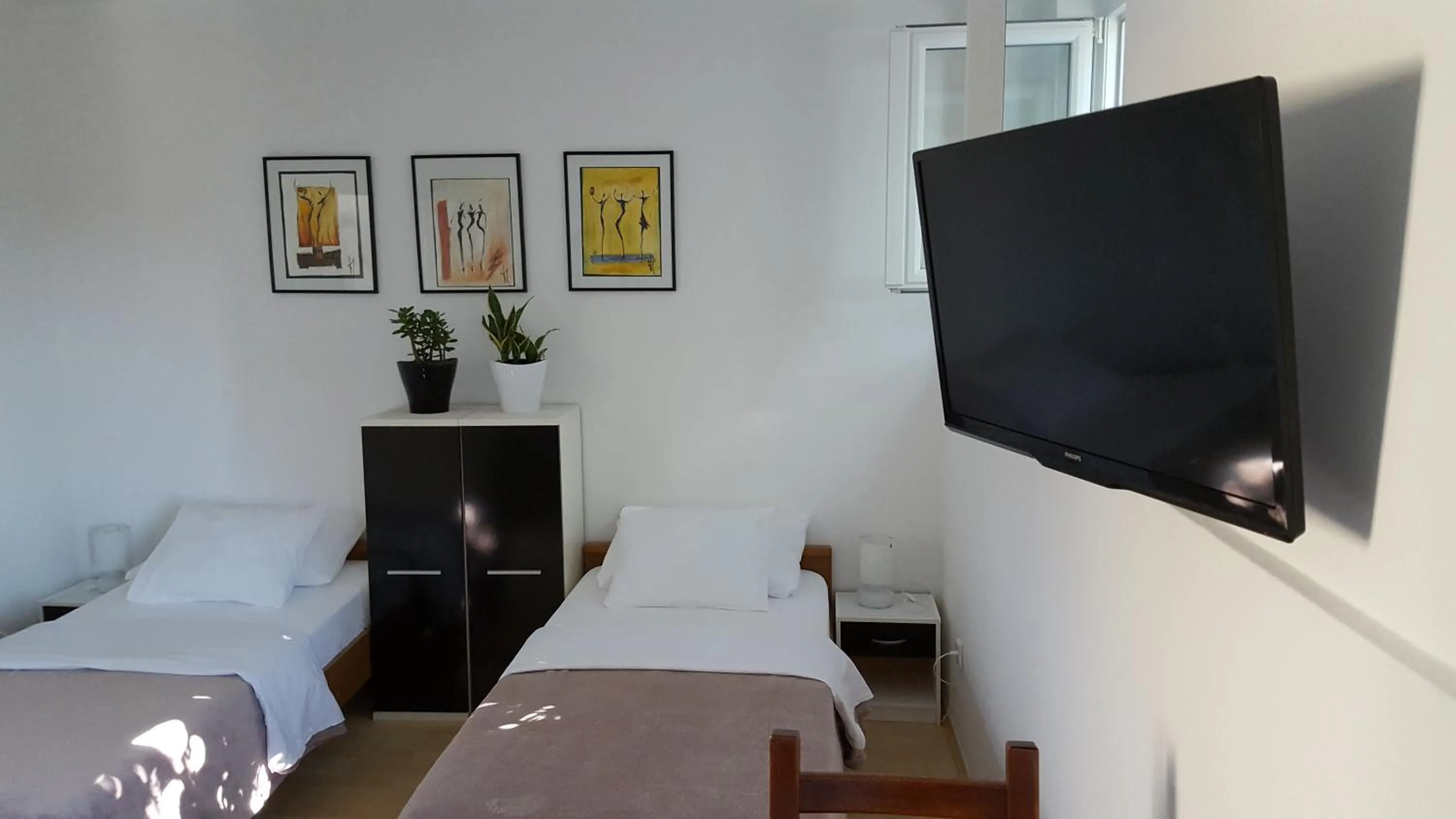 TV and multimedia, Bed in Turtle Apartments