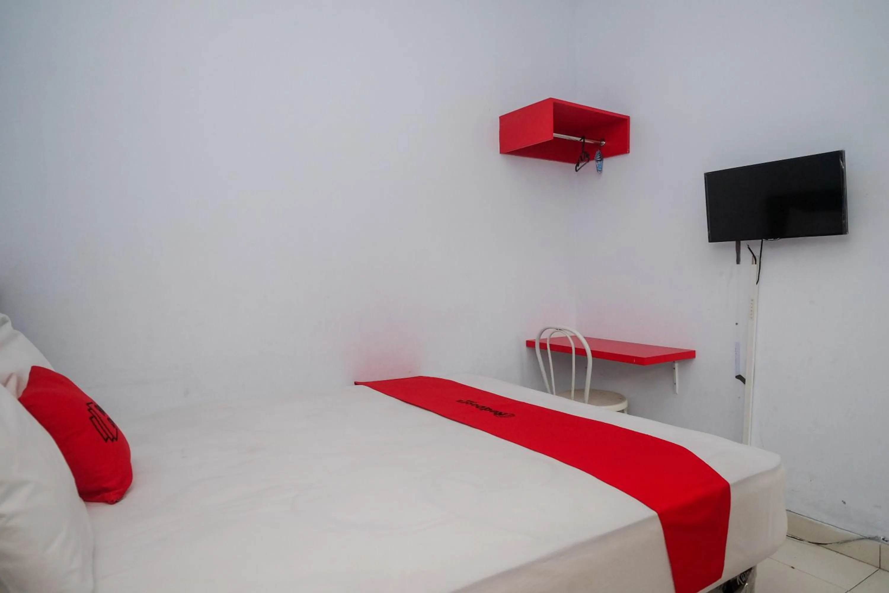 Bed in RedDoorz at Lapangan Bandara Sam Ratulangi Manado