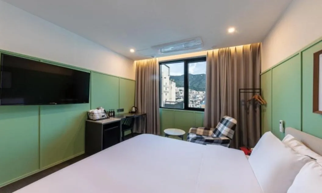 Bed in Brown Dot Hotel Deokcheon