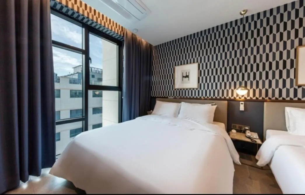 Bed in Brown Dot Hotel Deokcheon