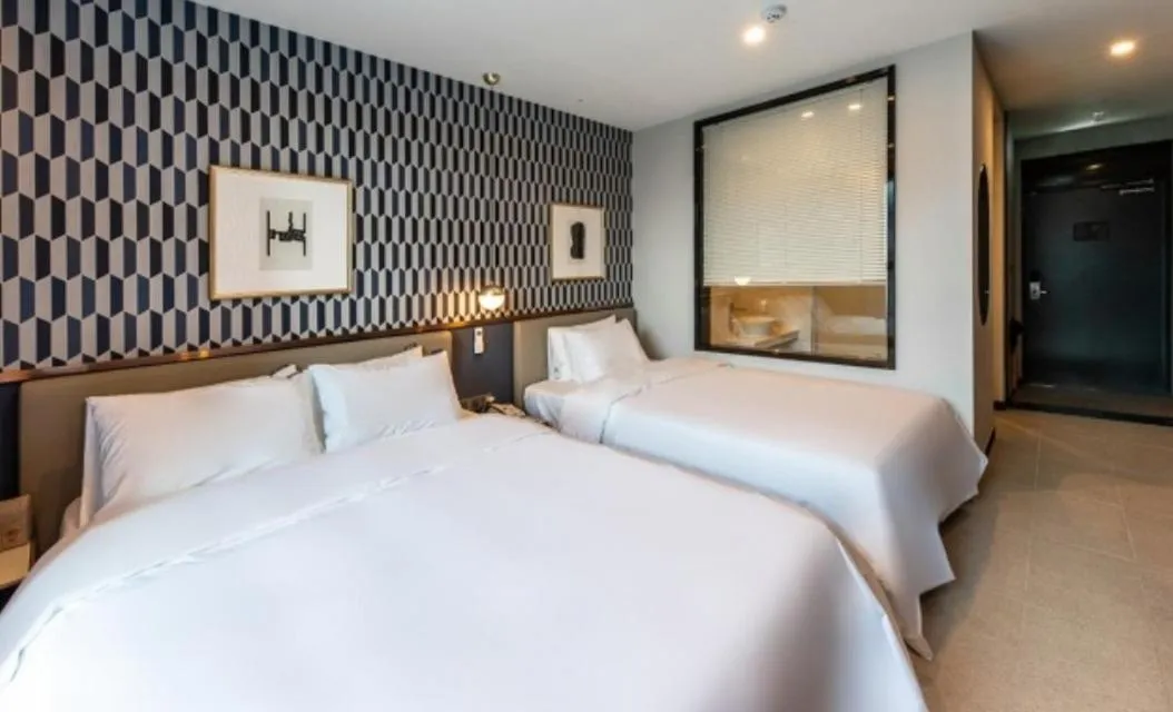 Bed in Brown Dot Hotel Deokcheon