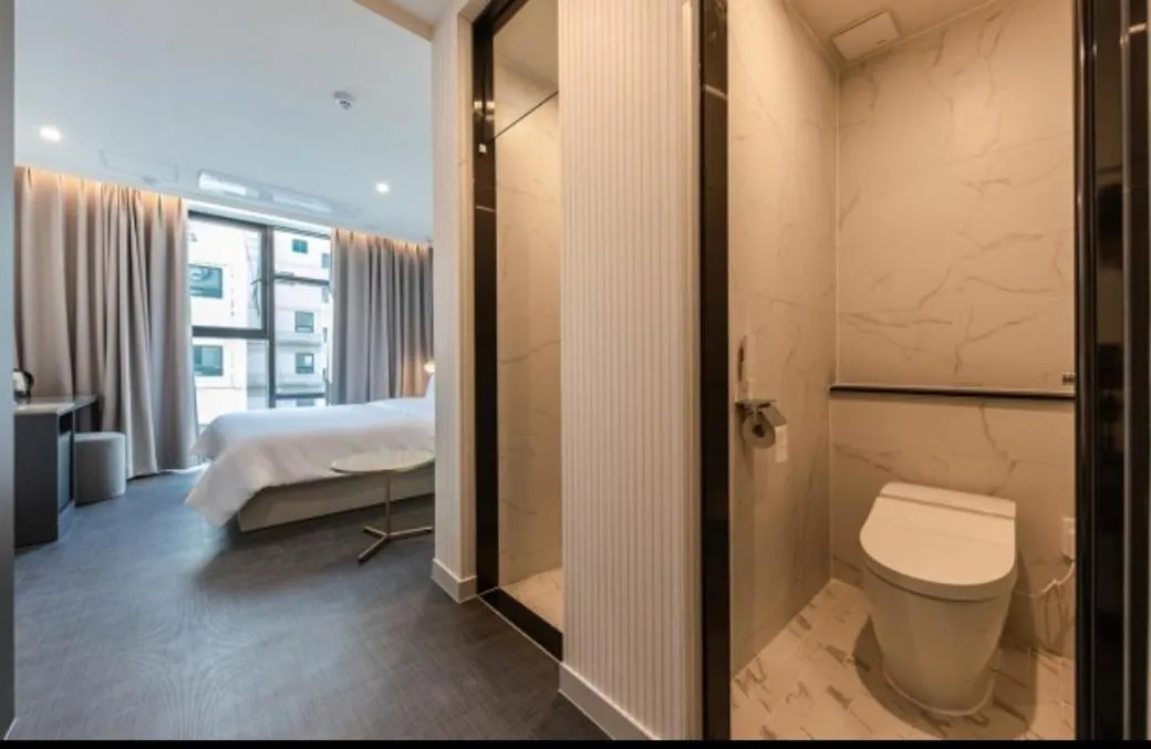 Bed in Brown Dot Hotel Deokcheon