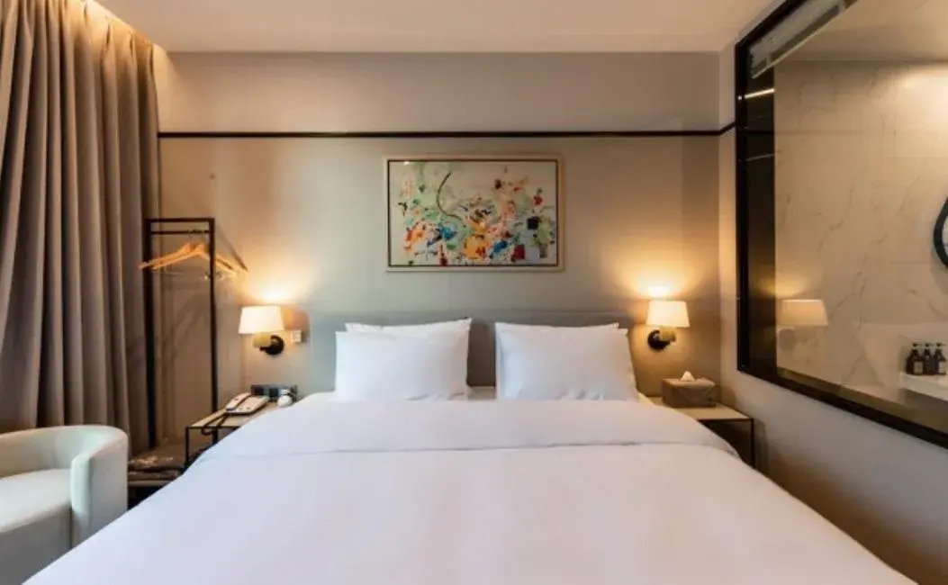 Bed in Brown Dot Hotel Deokcheon Bed in Brown Dot Hotel Deokcheon