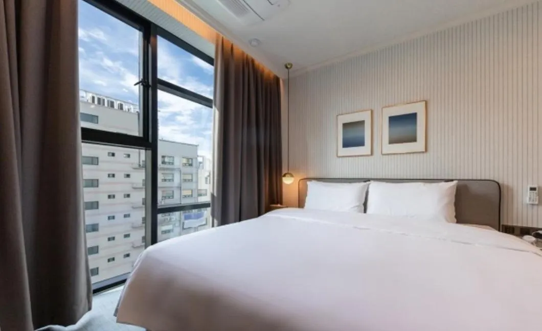 Bed in Brown Dot Hotel Deokcheon