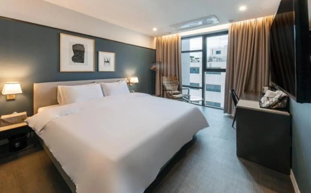 Bed in Brown Dot Hotel Deokcheon