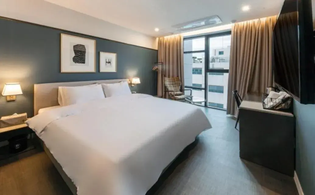 Bed in Brown Dot Hotel Deokcheon Bed in Brown Dot Hotel Deokcheon