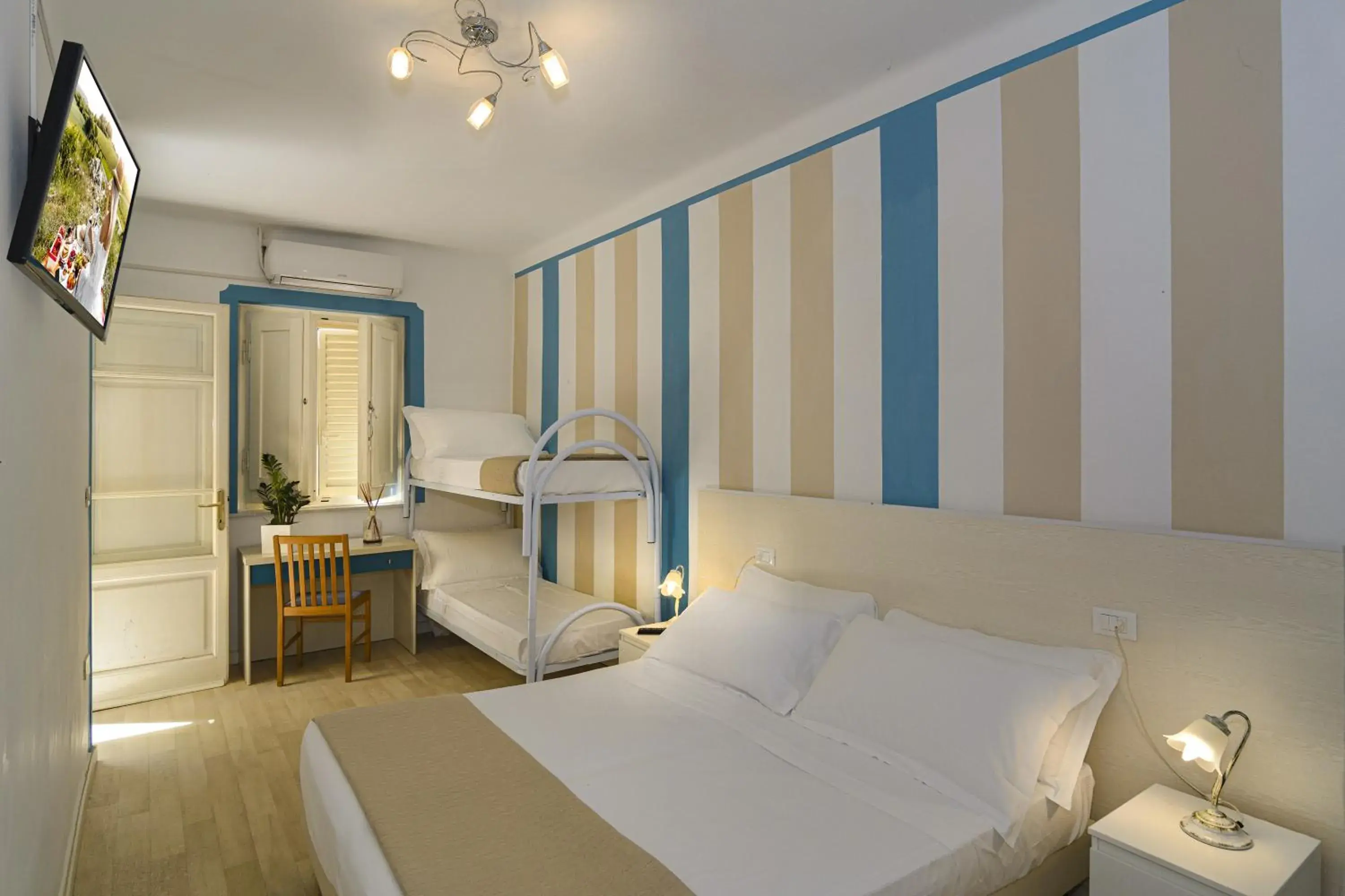 Standard Quadruple Room - Ground Floor in Hotel Lungomare Standard Quadruple Room - Ground Floor in Hotel Lungomare