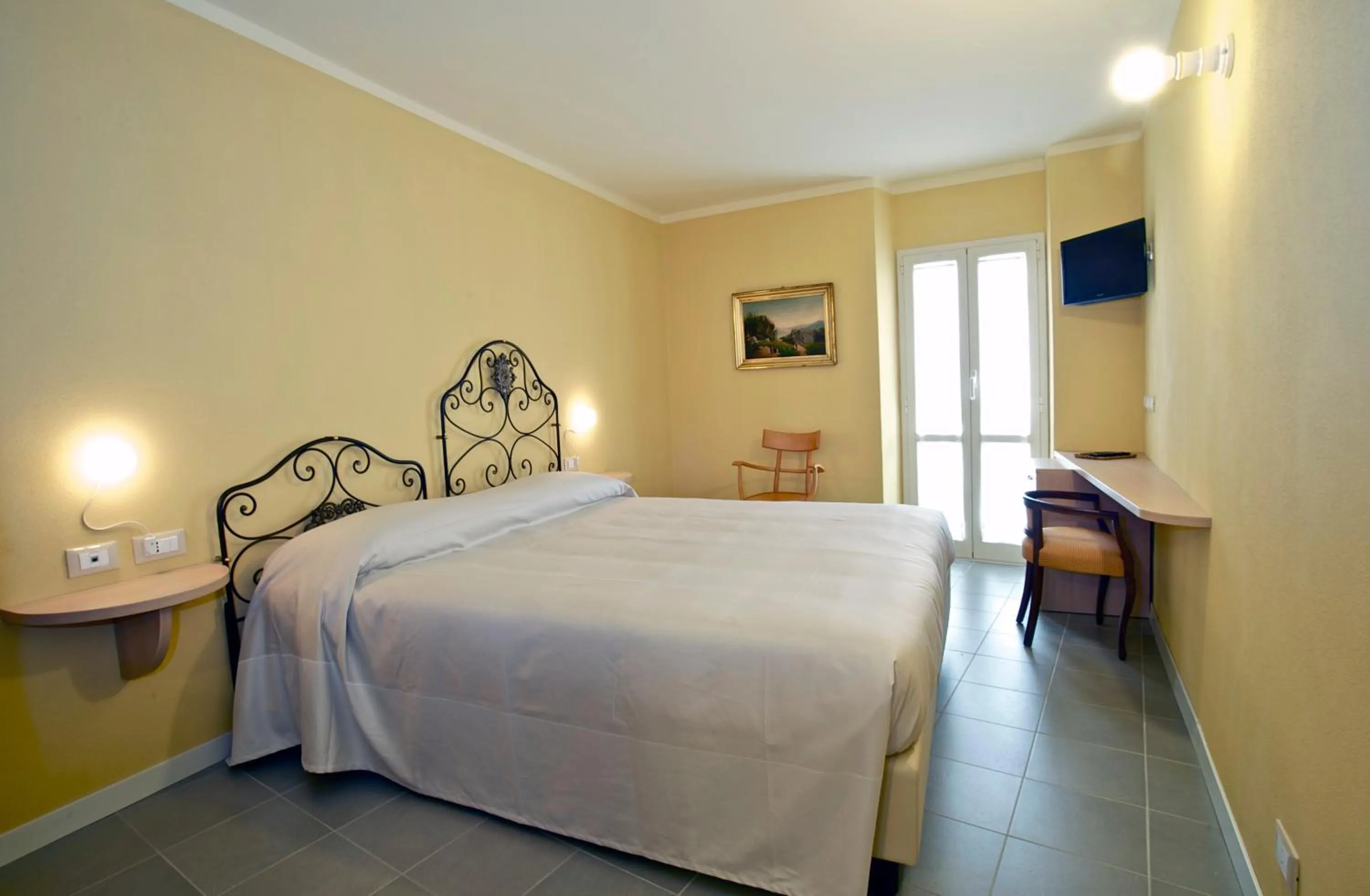Photo of the whole room, Bed in Locanda della Maria