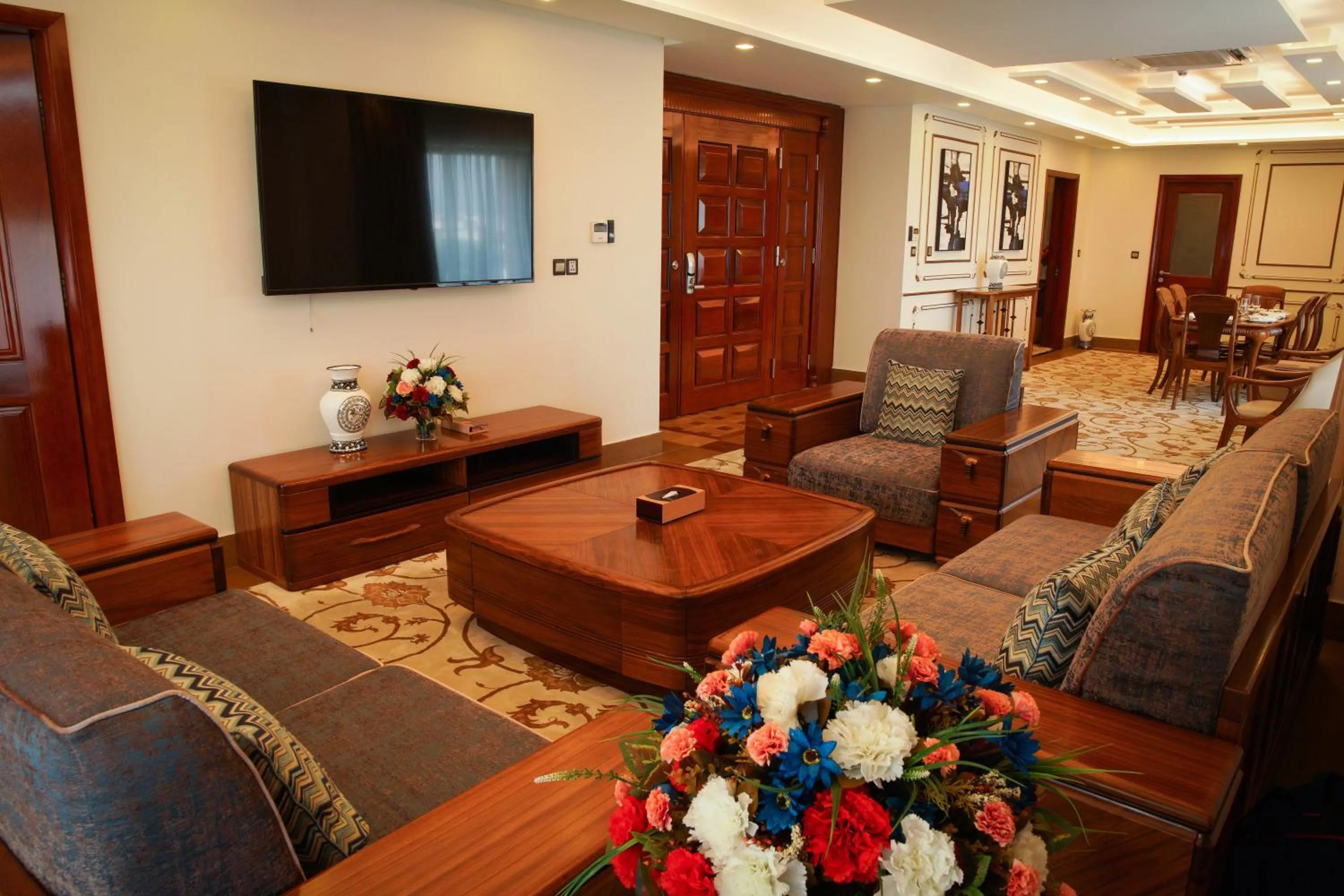 Communal lounge/ TV room in Royal Swiss Lahore