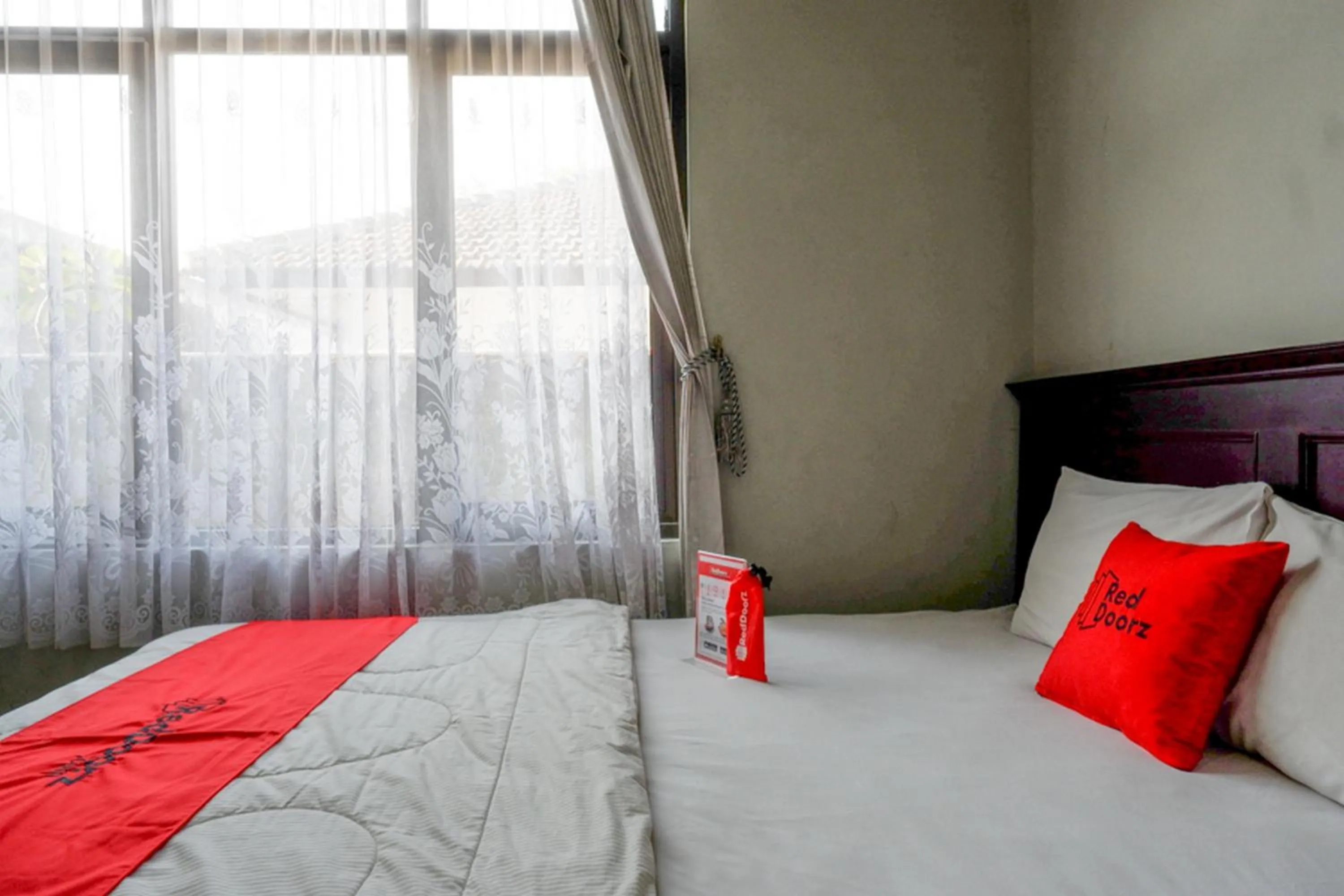 Bedroom in RedDoorz Syariah near Menara Kudus