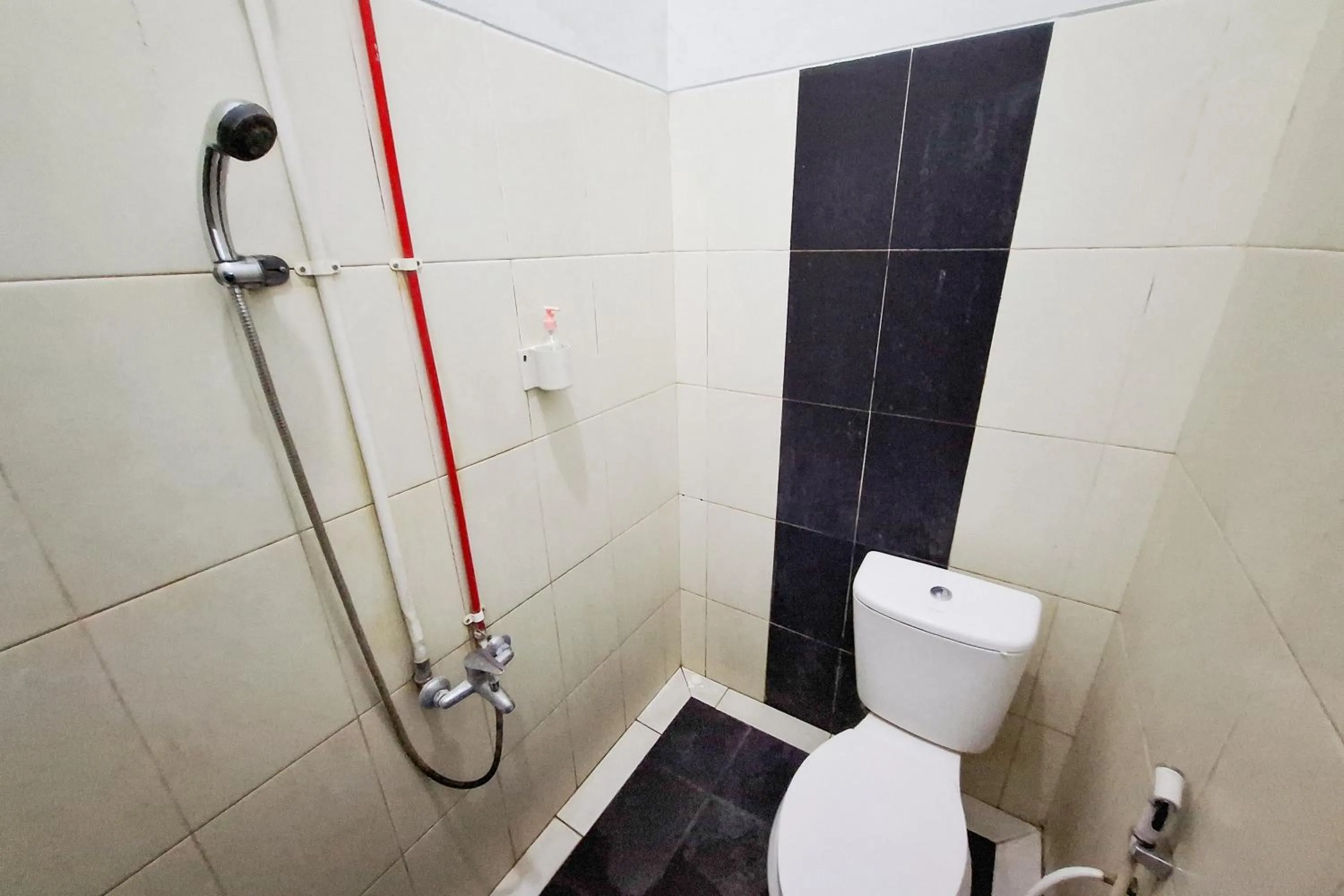 Bathroom in RedDoorz Syariah at Harmoni near Alun Alun Kudus