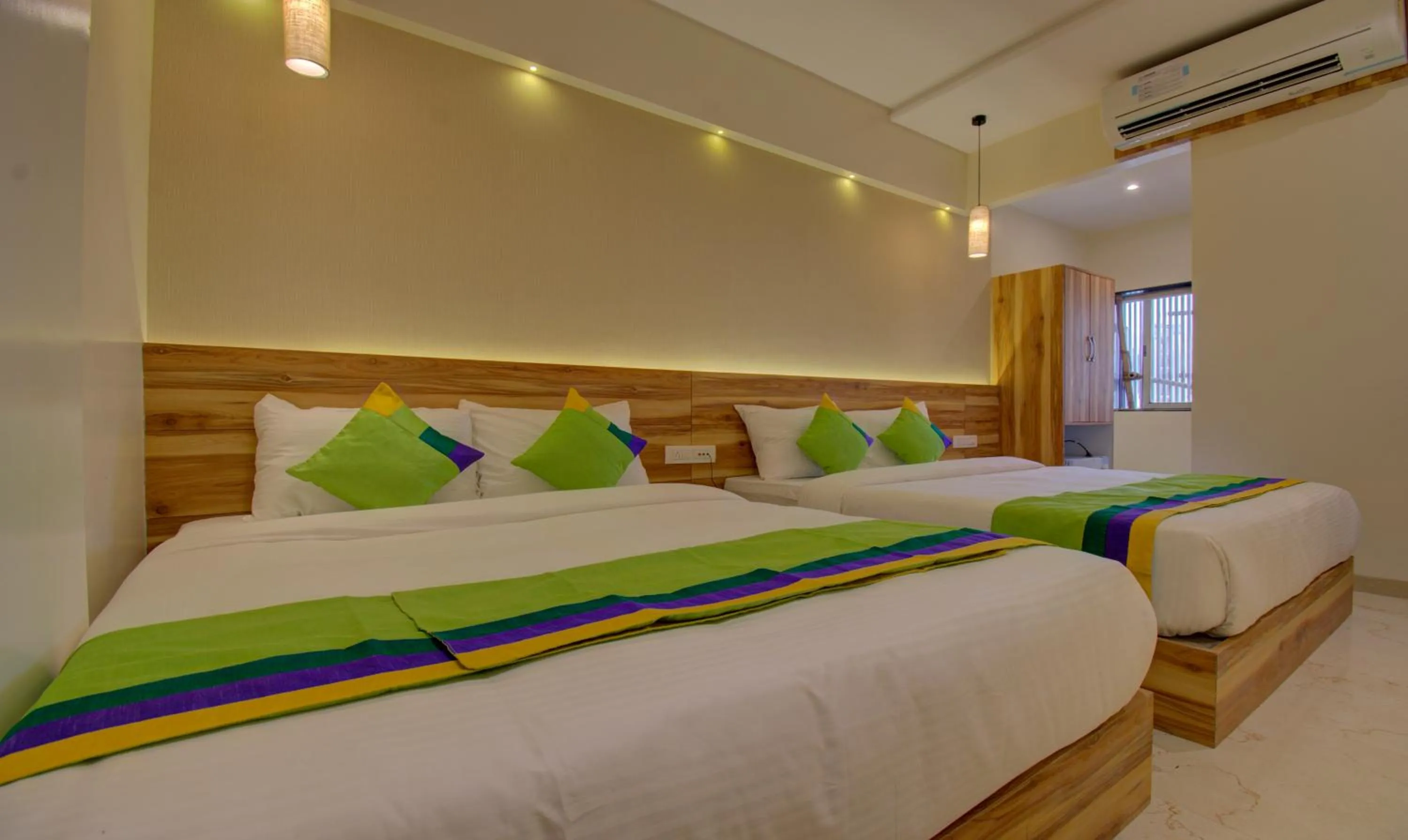 Bed in Hotel Amisha International