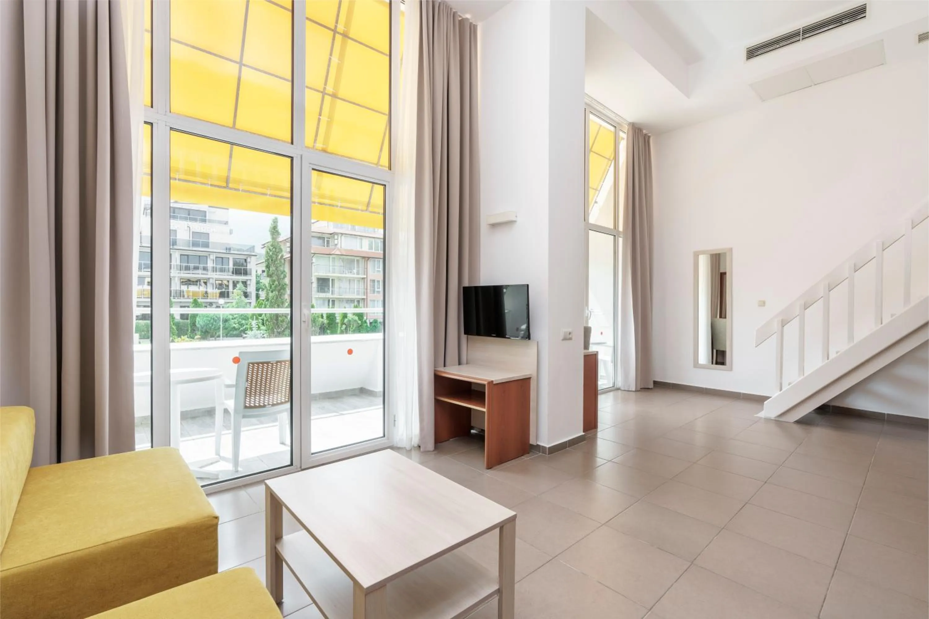 Living room in AluaSun Helios Beach - All Inclusive