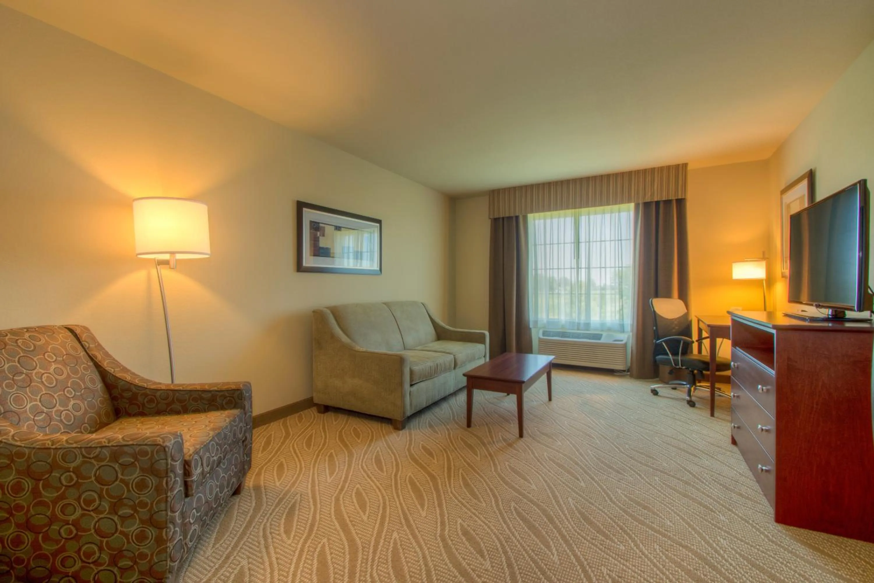 Living room in Cobblestone Inn & Suites - Holyoke