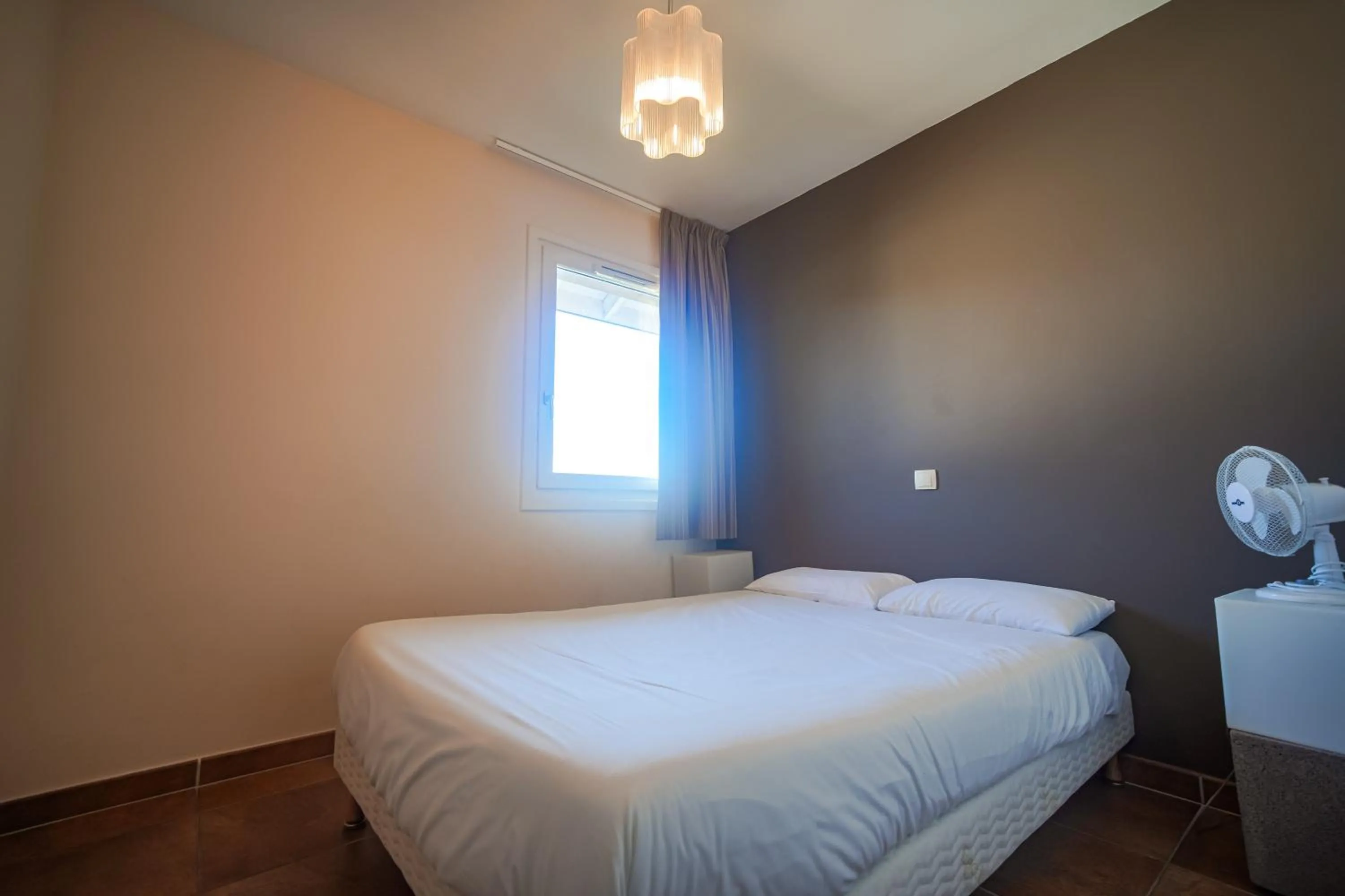 Photo of the whole room, Bed in Residence Les Chataigniers