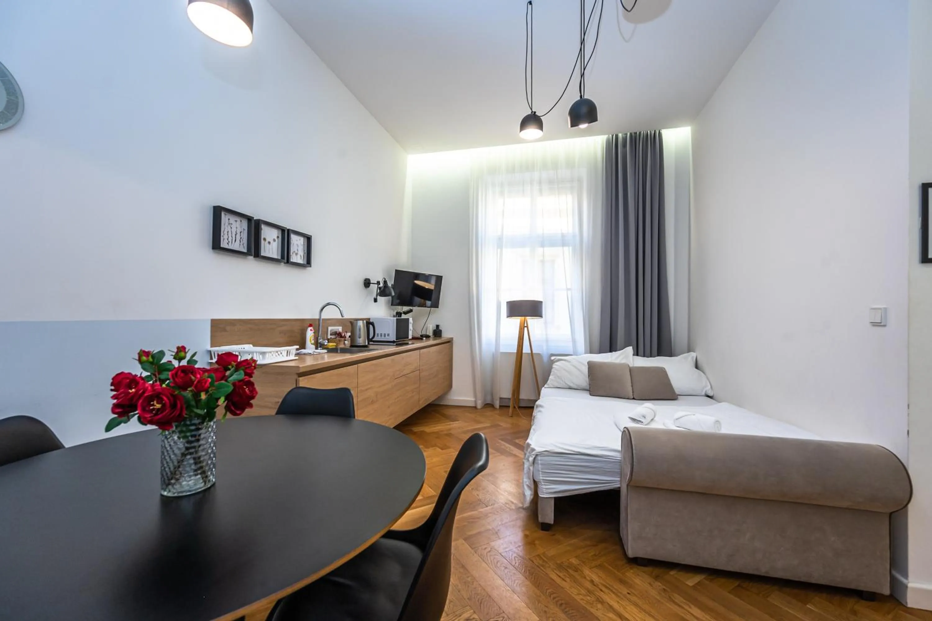 Kitchen or kitchenette, Bed in Apartrezidence Opletalova