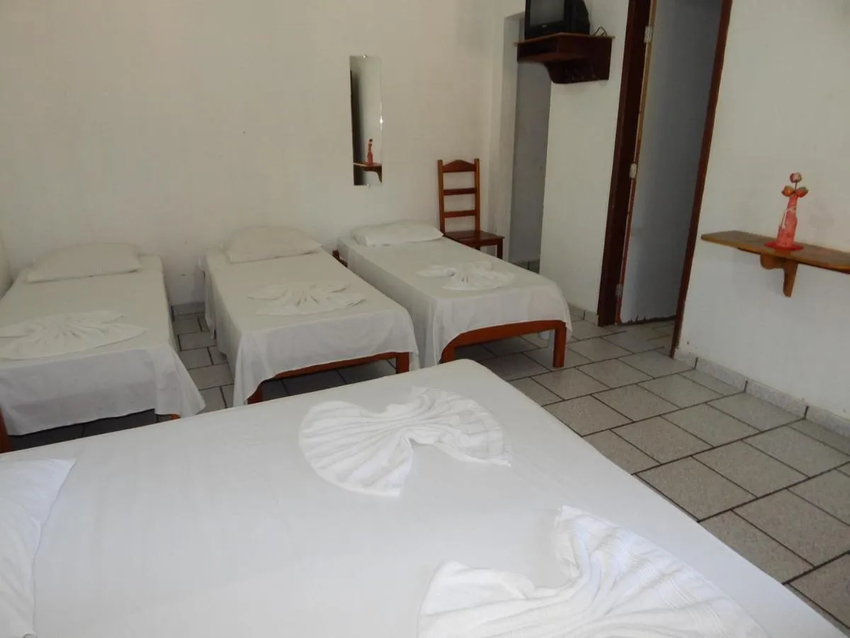 Bed in Pousada Água de Côco