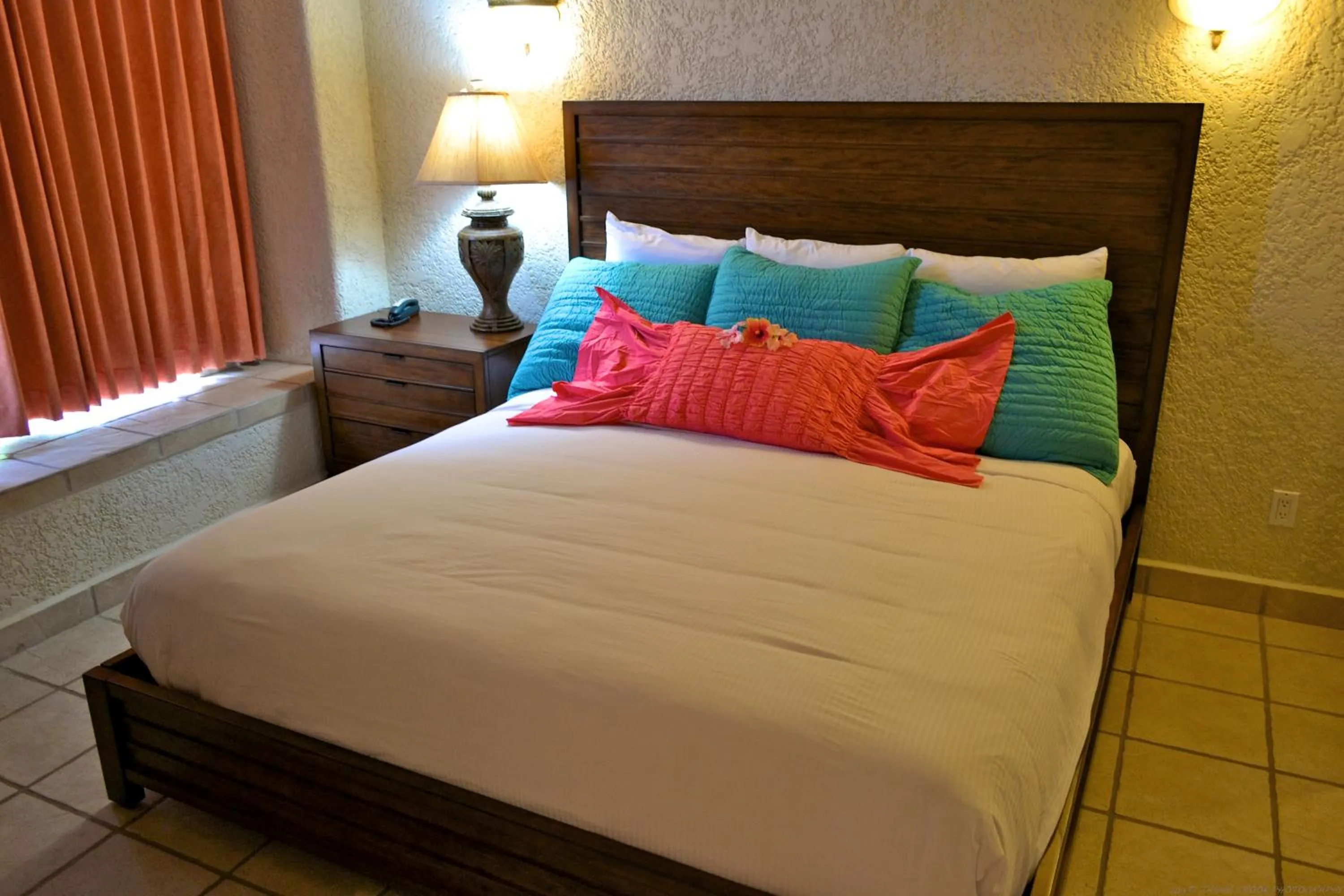 Bed in Mayan Princess Beach & Dive Resort