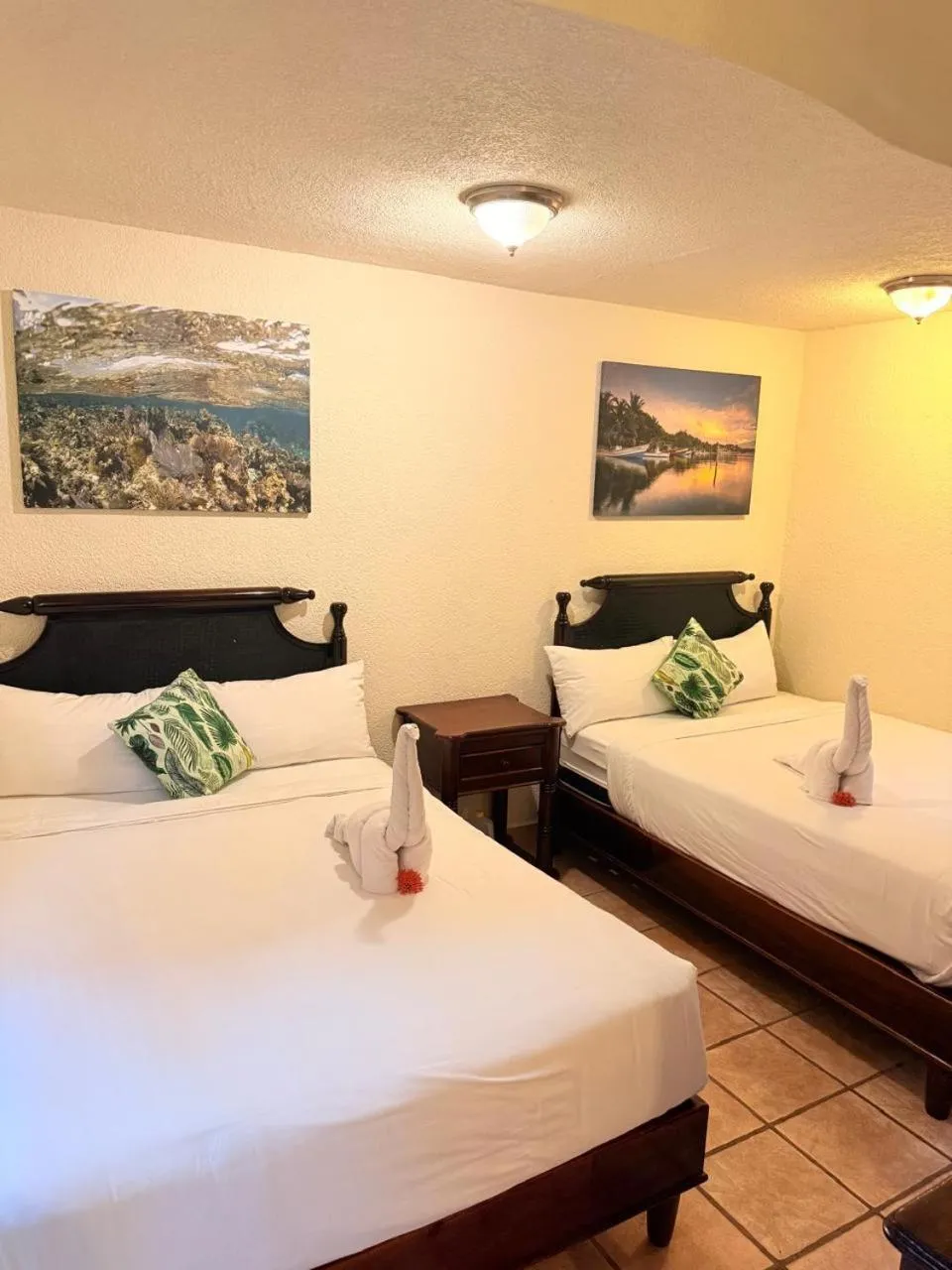 Bed in Mayan Princess Beach & Dive Resort
