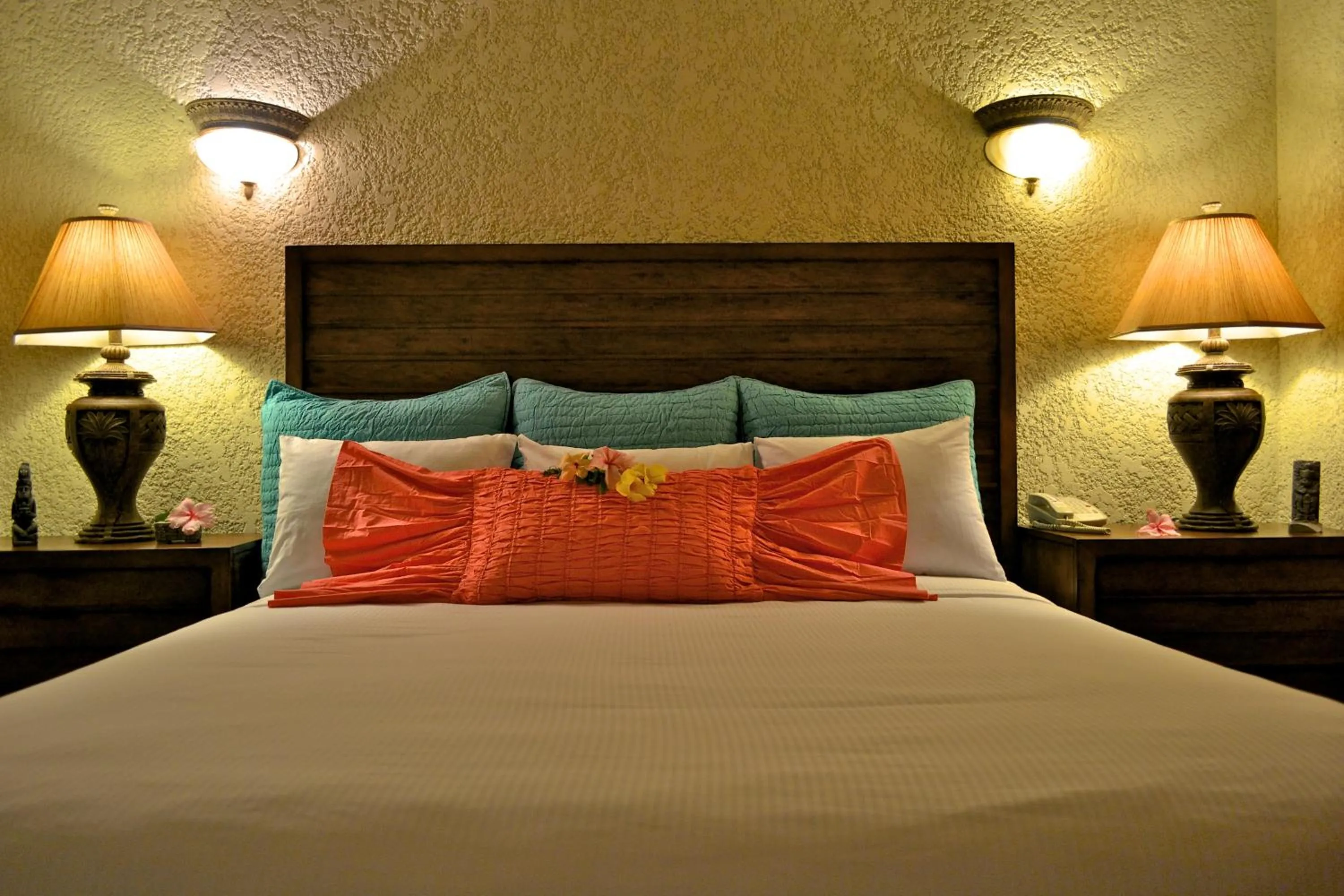 Bed in Mayan Princess Beach & Dive Resort