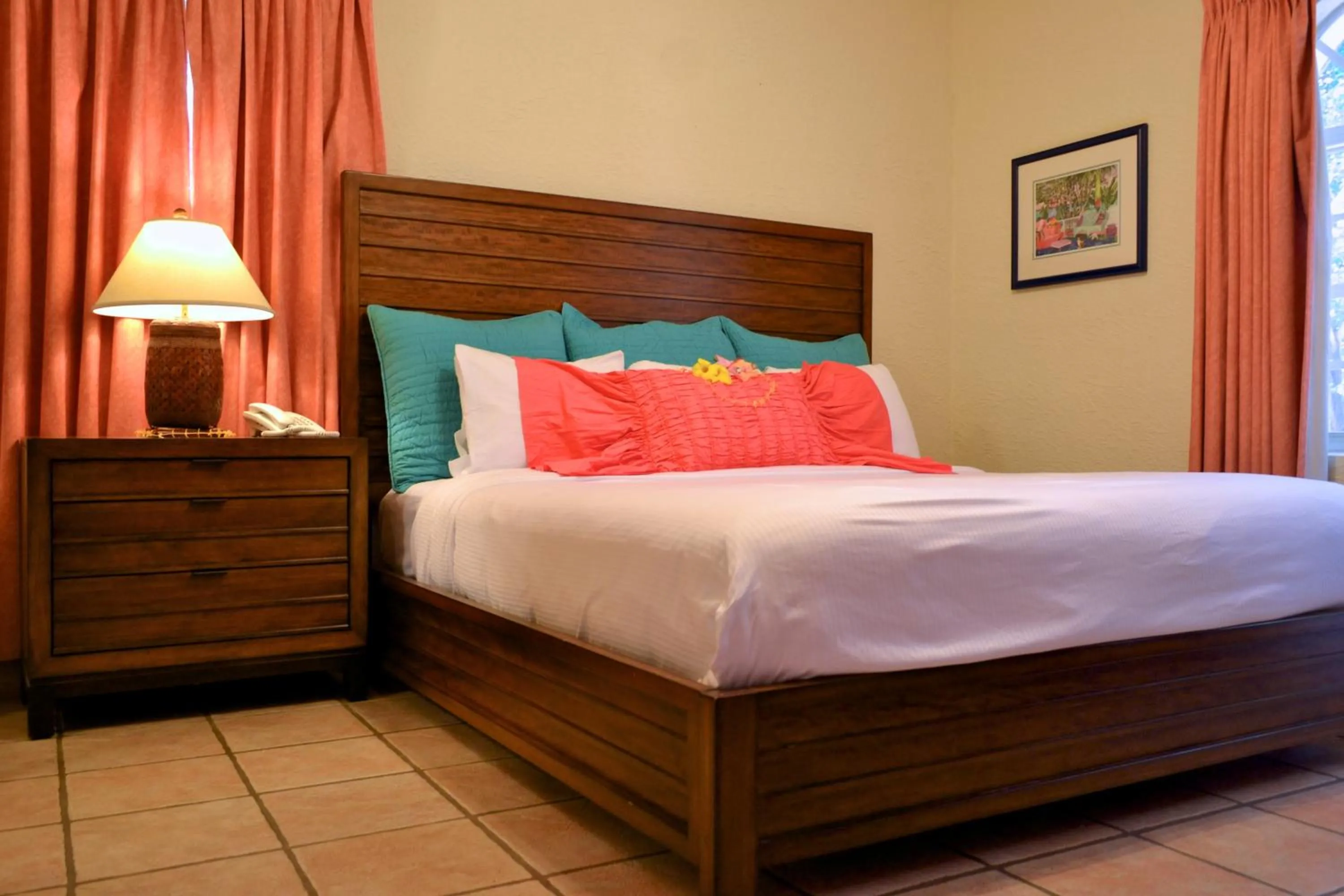 Bed in Mayan Princess Beach & Dive Resort