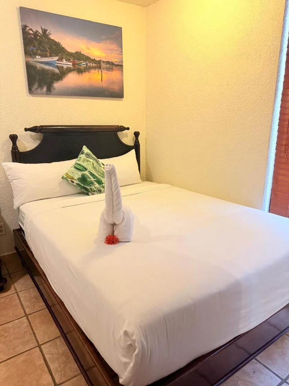 Bed in Mayan Princess Beach & Dive Resort