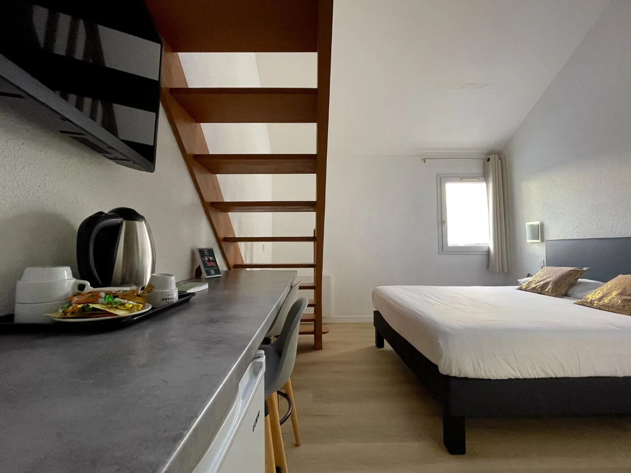 Bed in LOGIS Hôtel ARCADIA