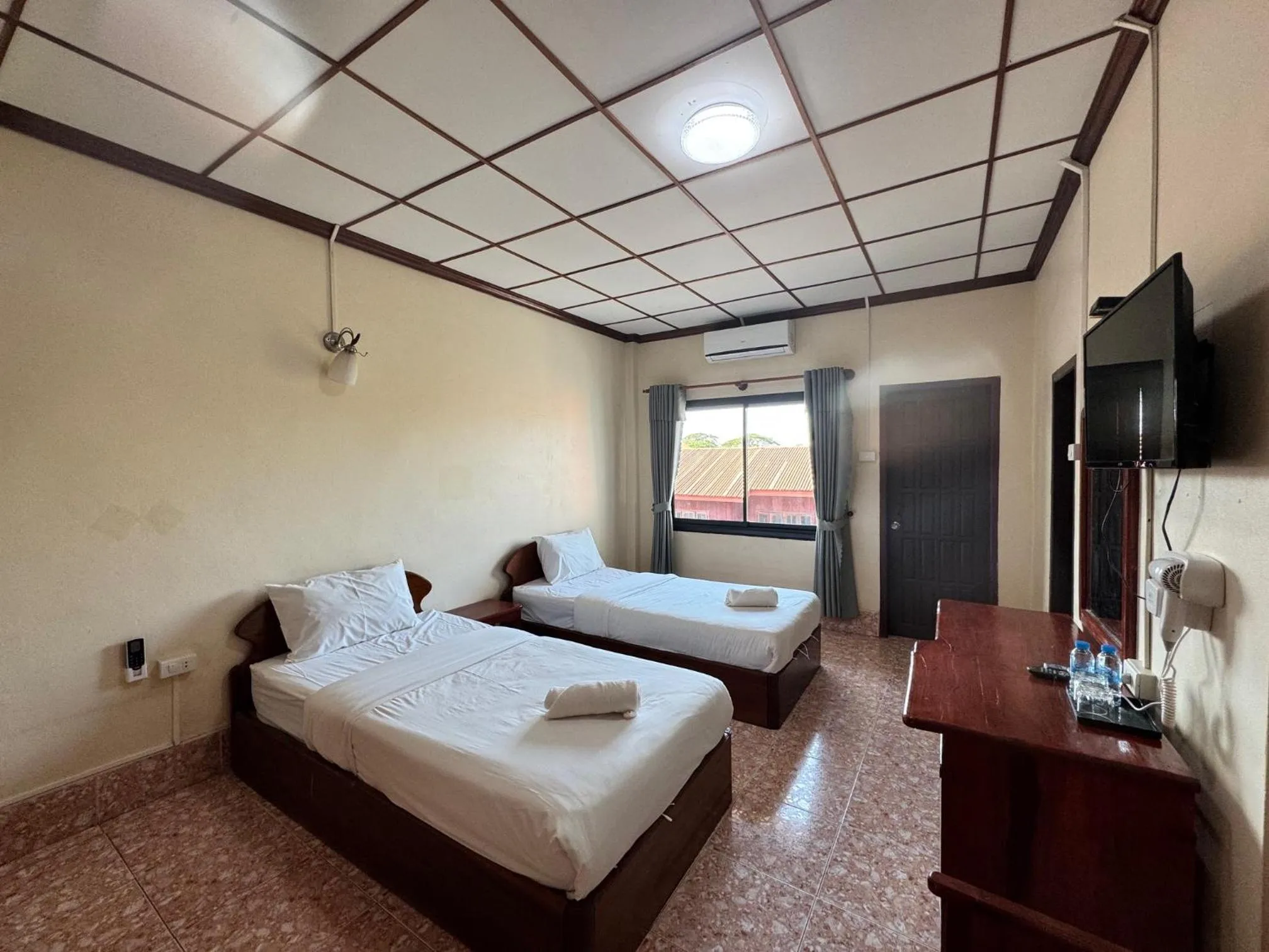 Bed in Phaythavone Hotel