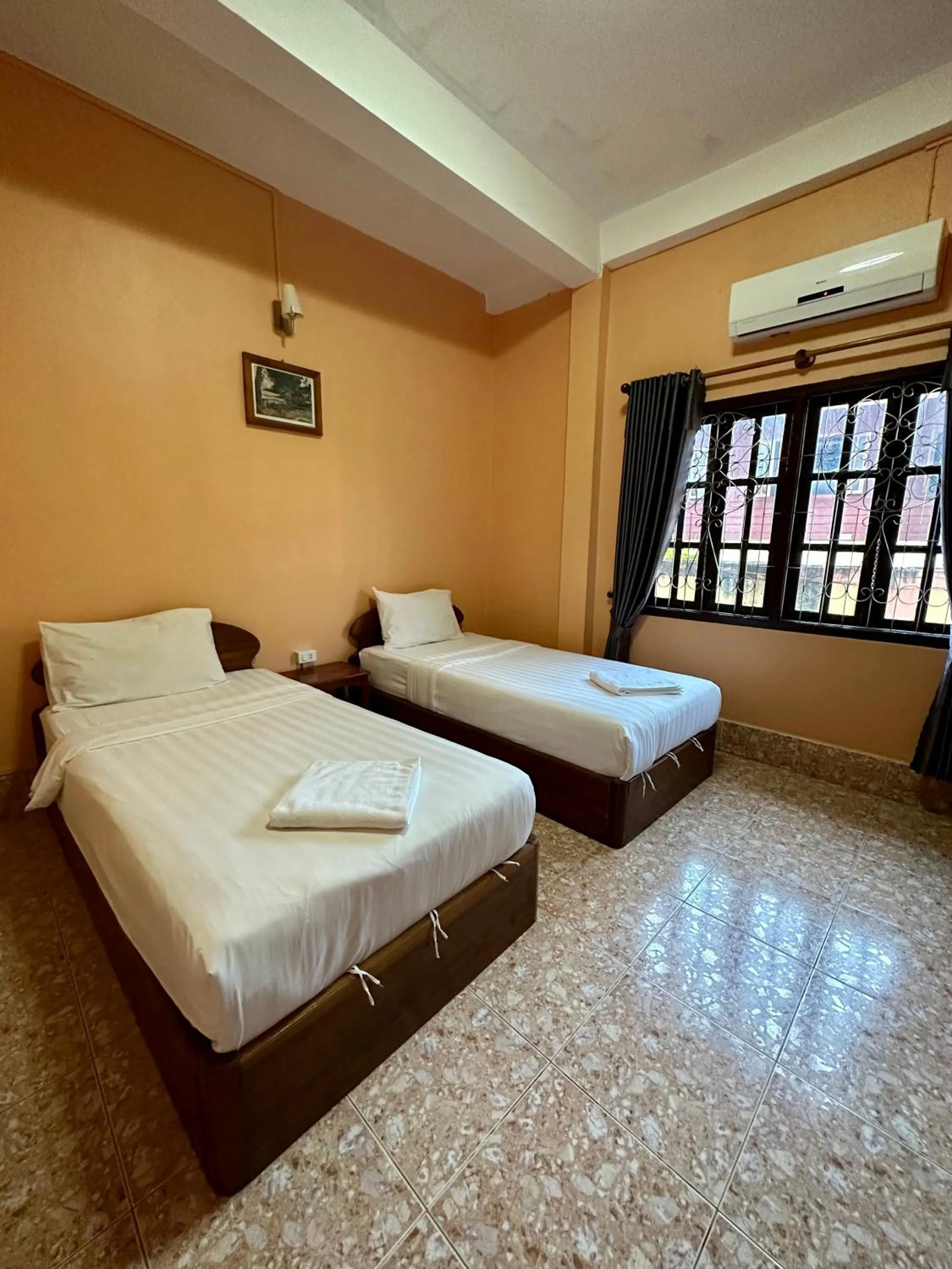 Bed in Phaythavone Hotel