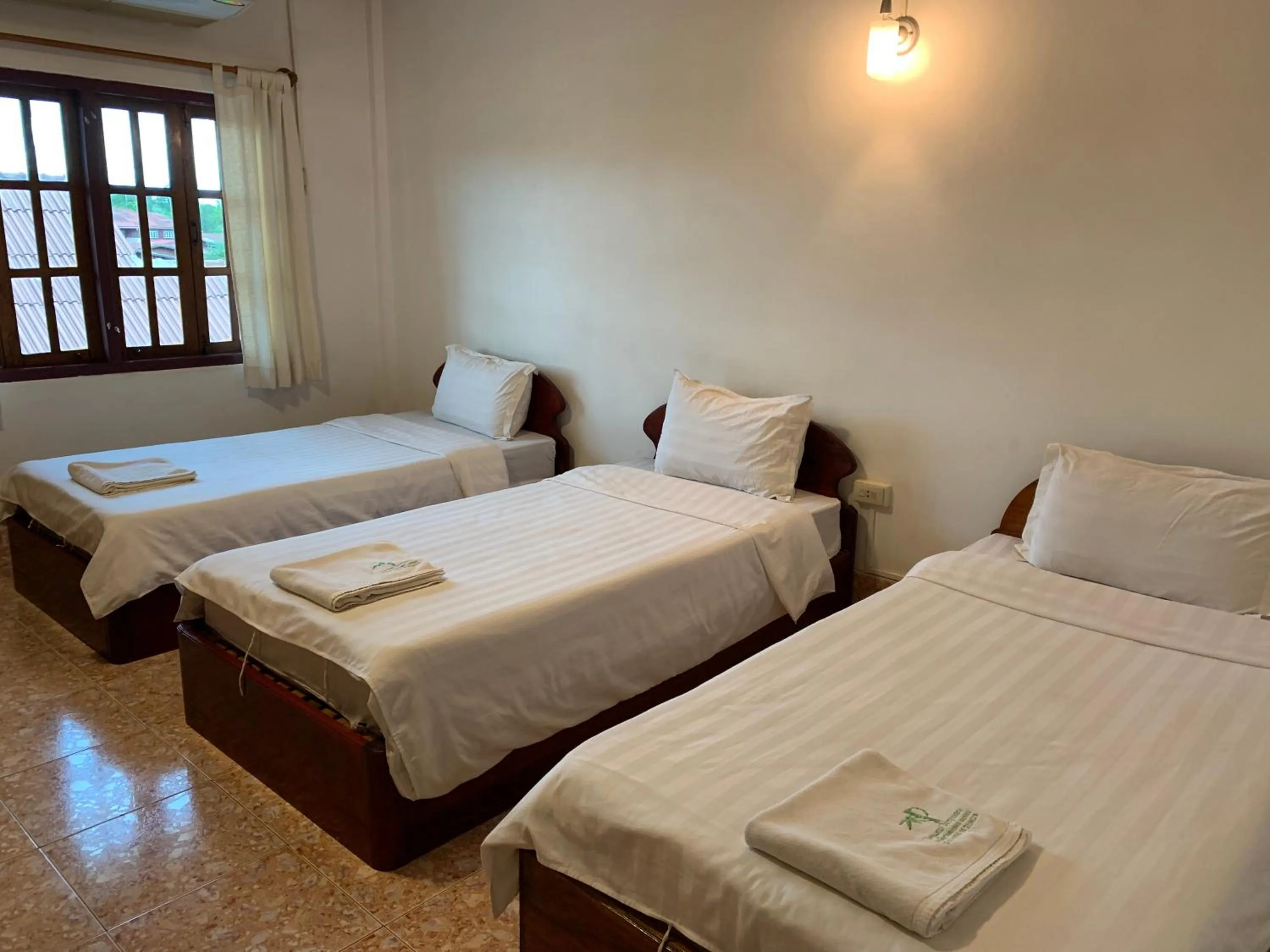 Bed in Phaythavone Hotel