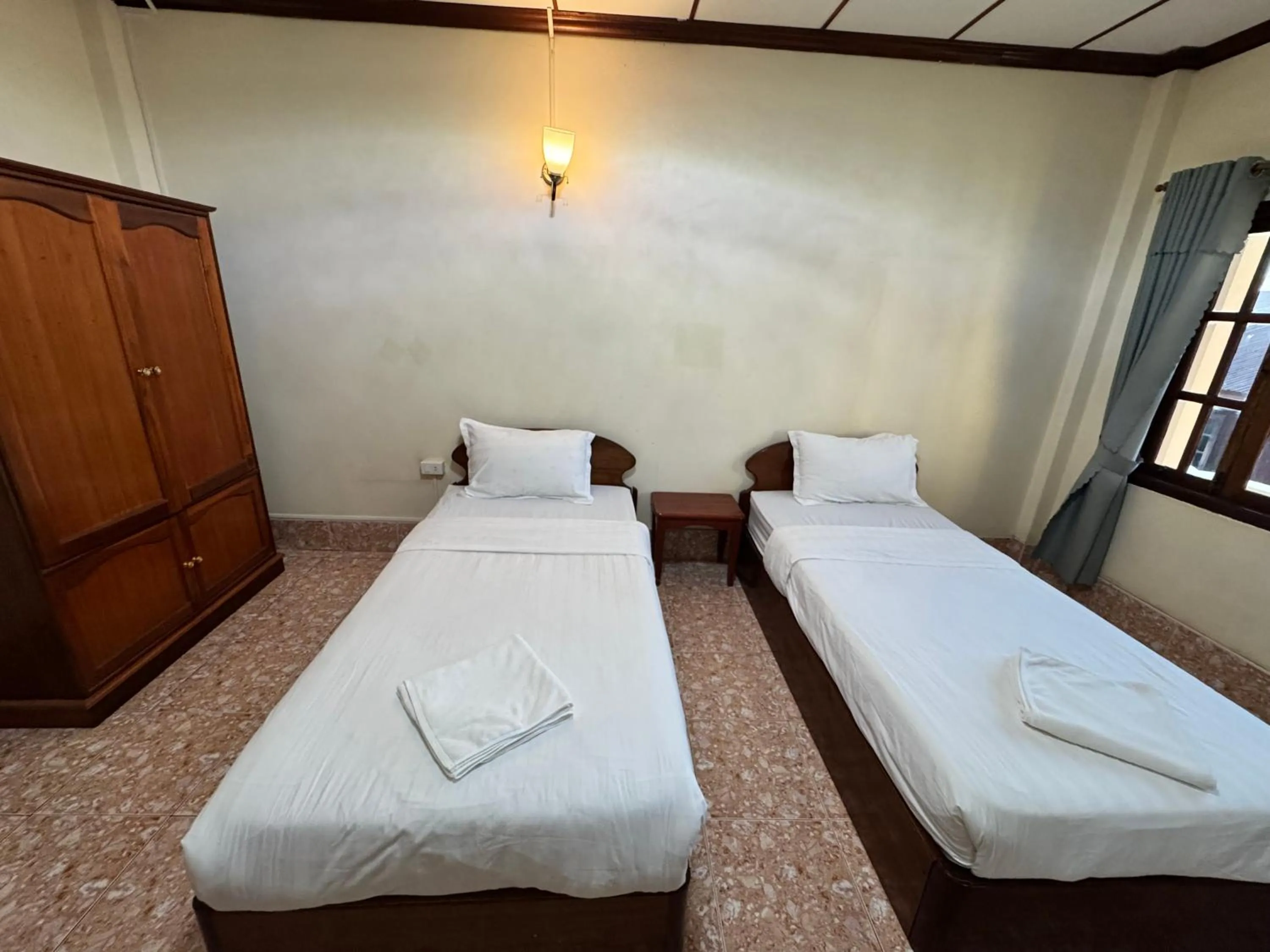 Bed in Phaythavone Hotel