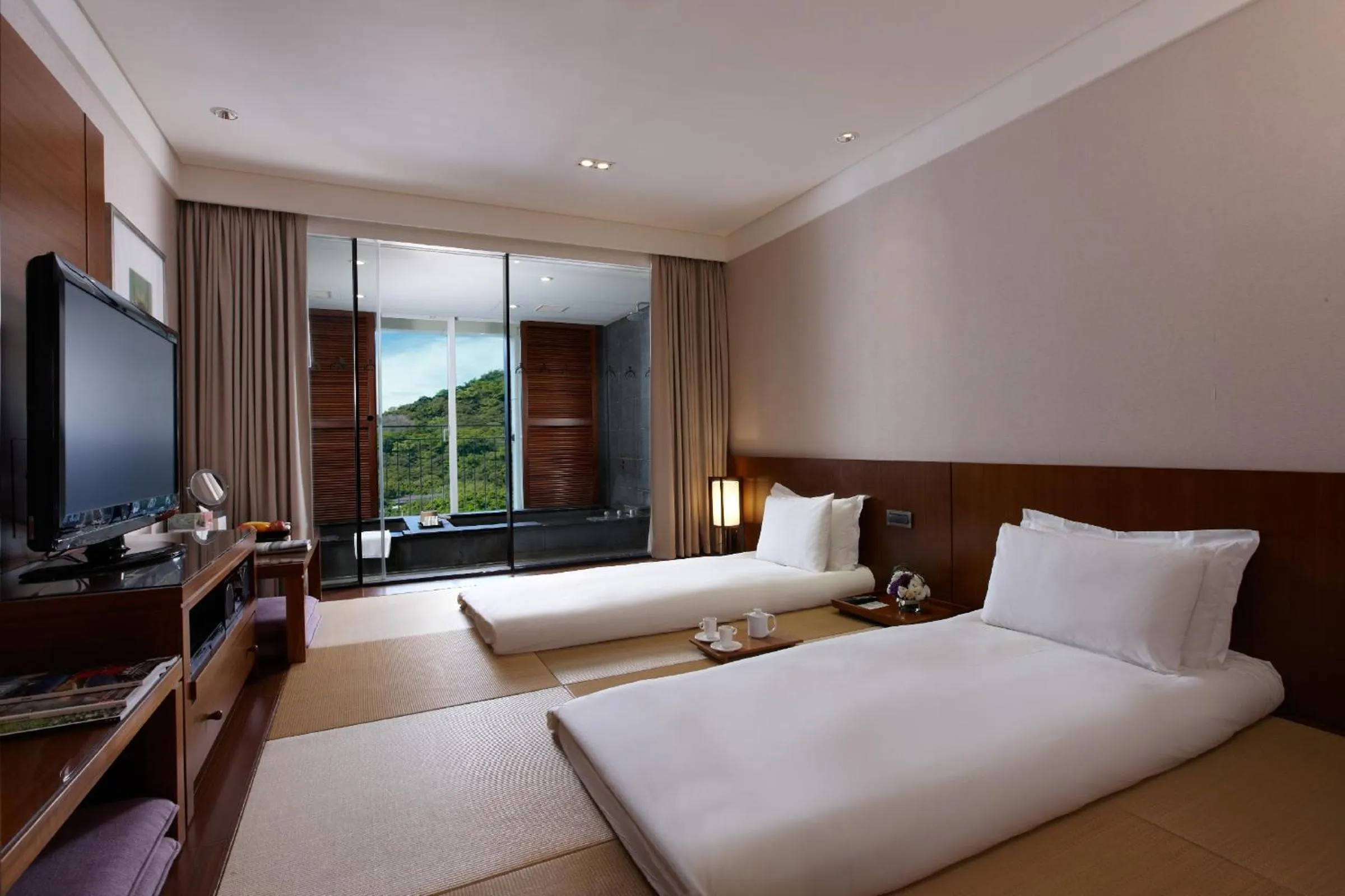 Photo of the whole room, Bed in RSL Cold & Hot Springs Resort Suao