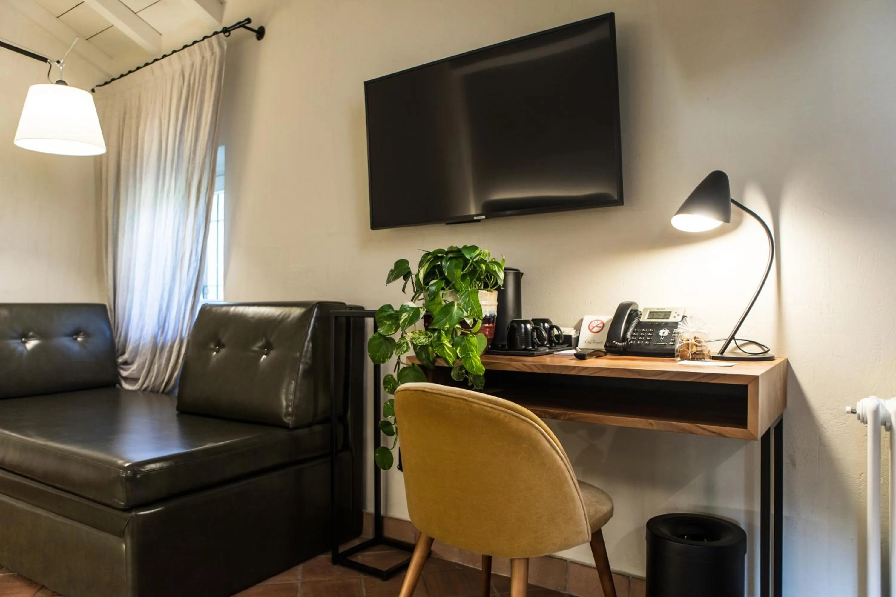 Seating area in Cà Toresele Relais Osteria Garden