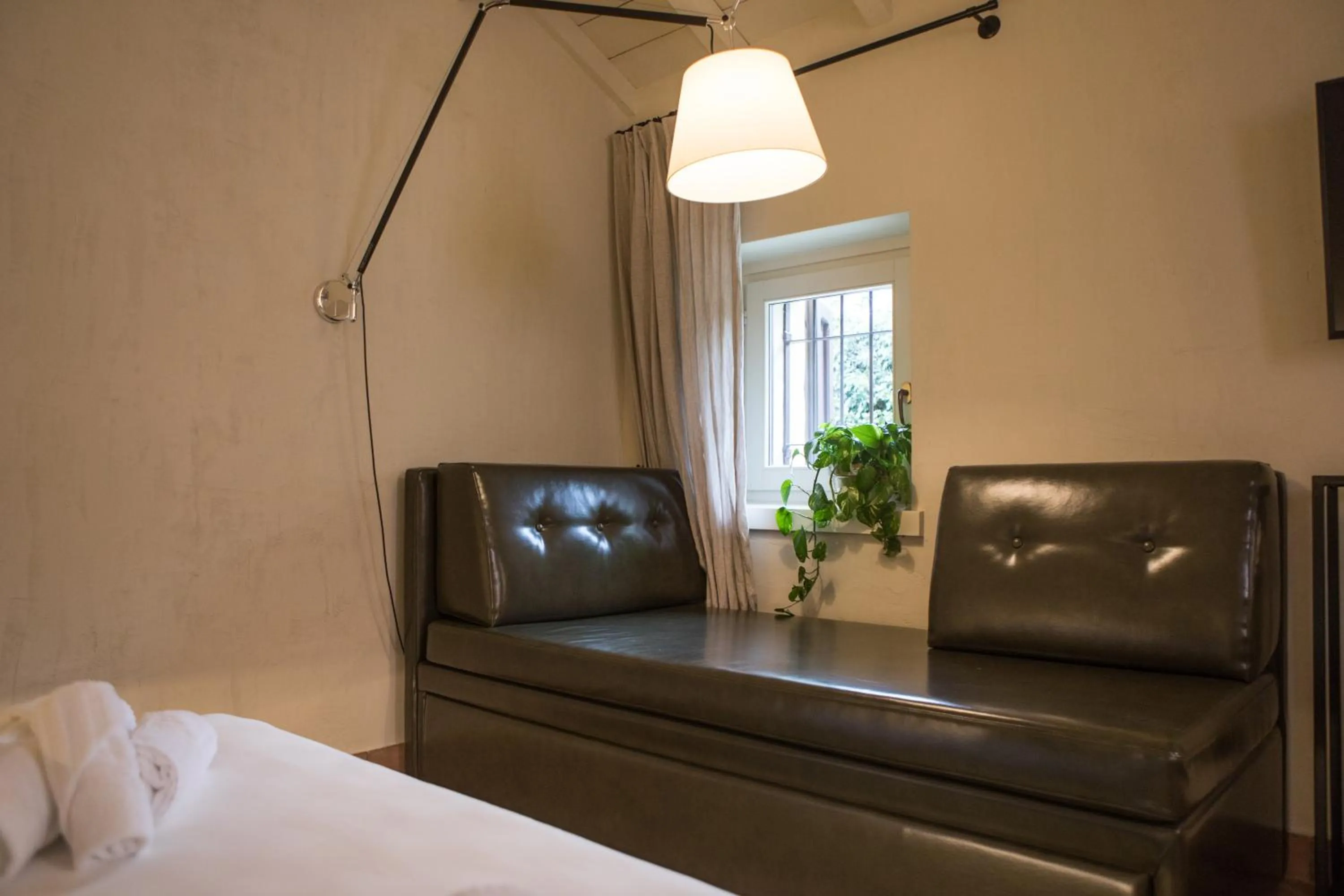 Seating area, Bed in Cà Toresele Relais Osteria Garden