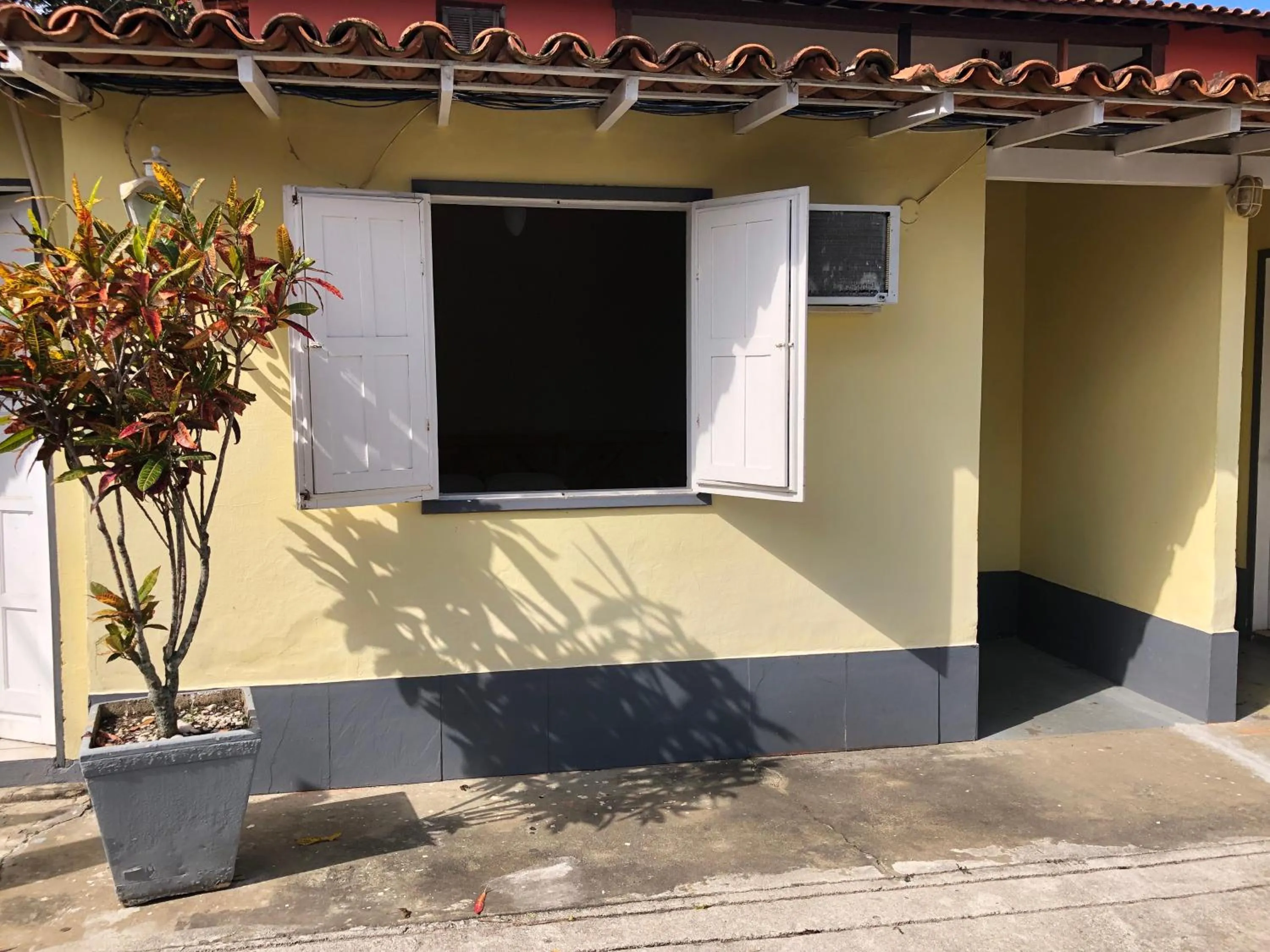 Bedroom in Suites por do Sol