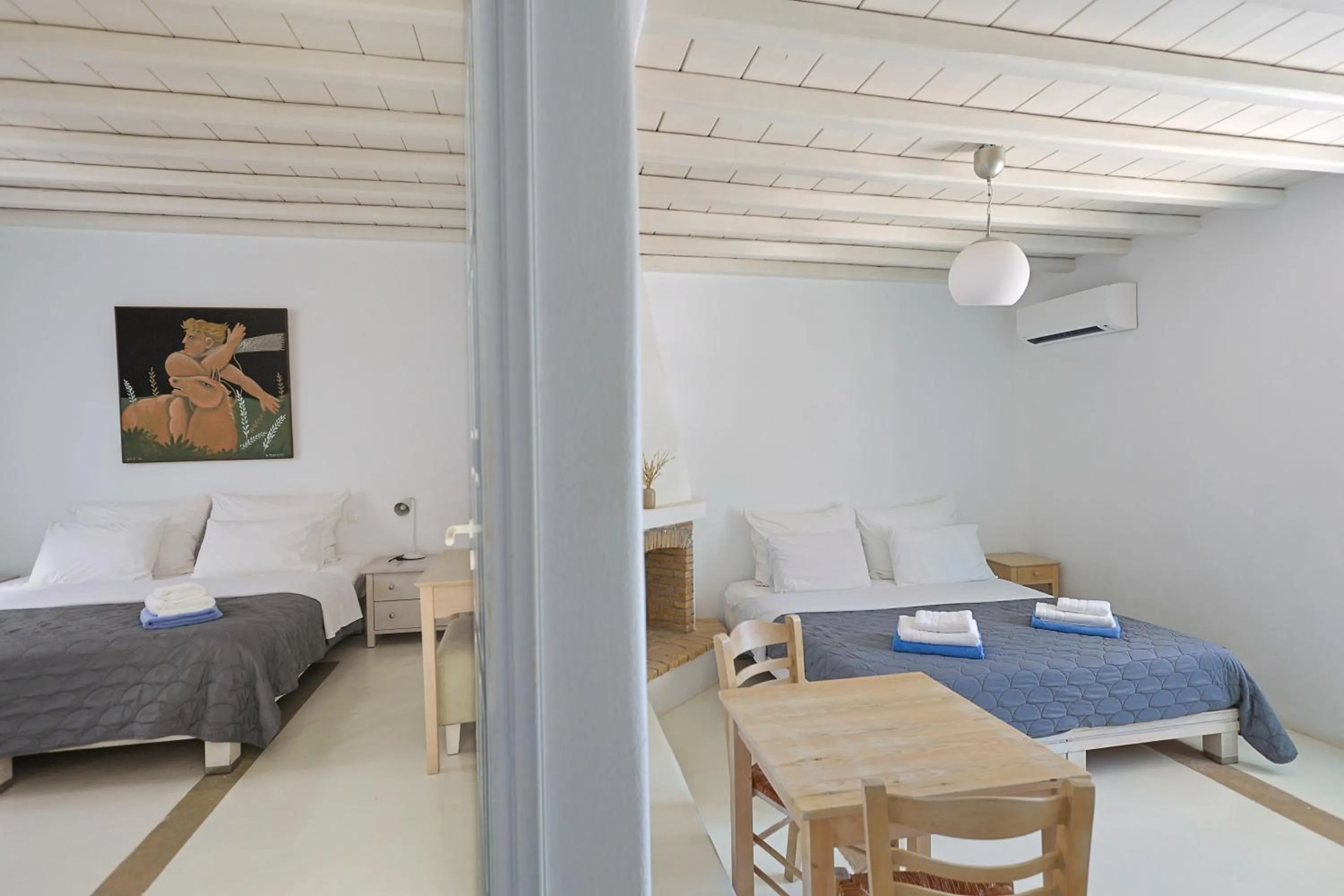 Living room, Bed in Mykonos Pantheon