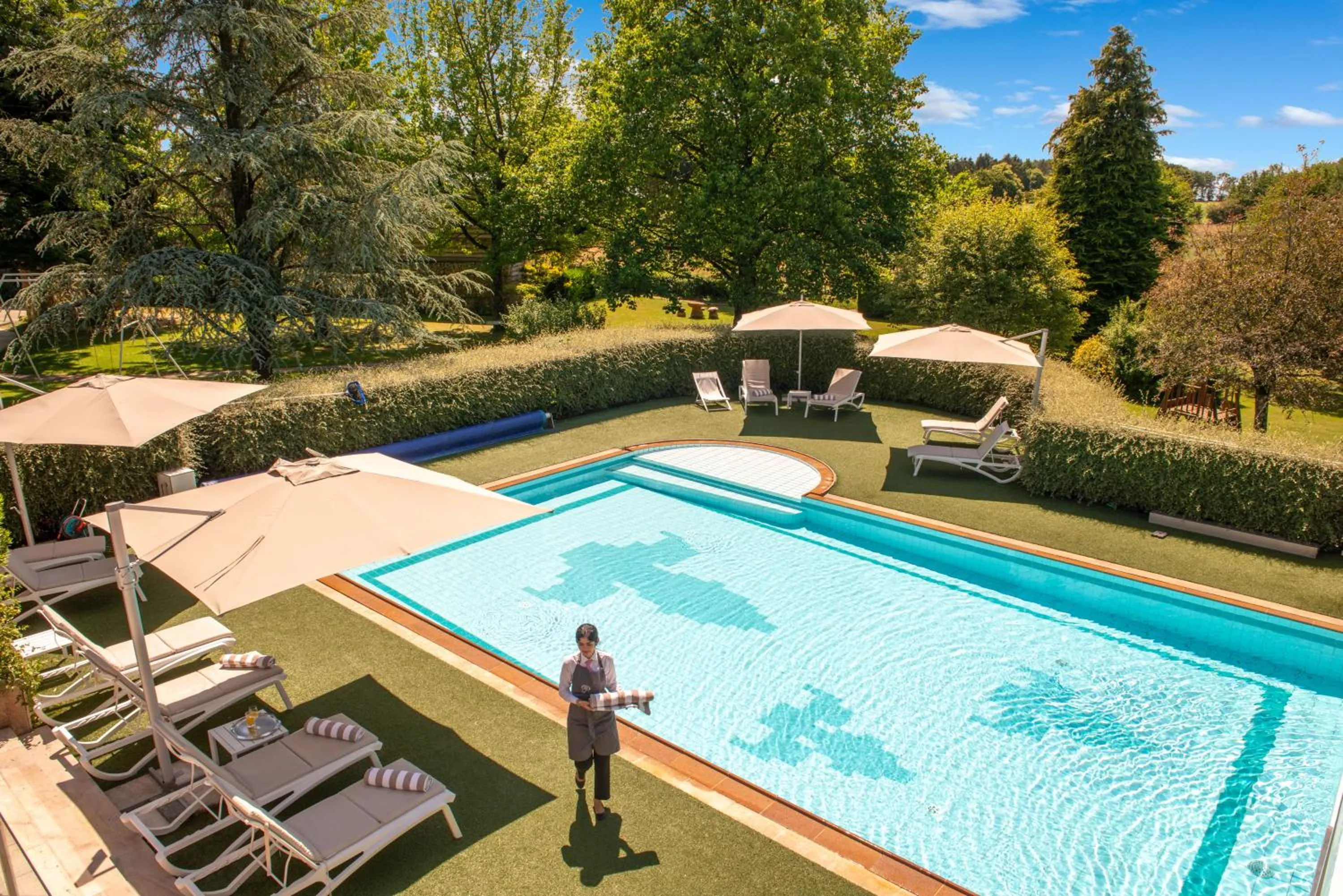 Pool view in Le Manoir du Lys, The Originals Relais