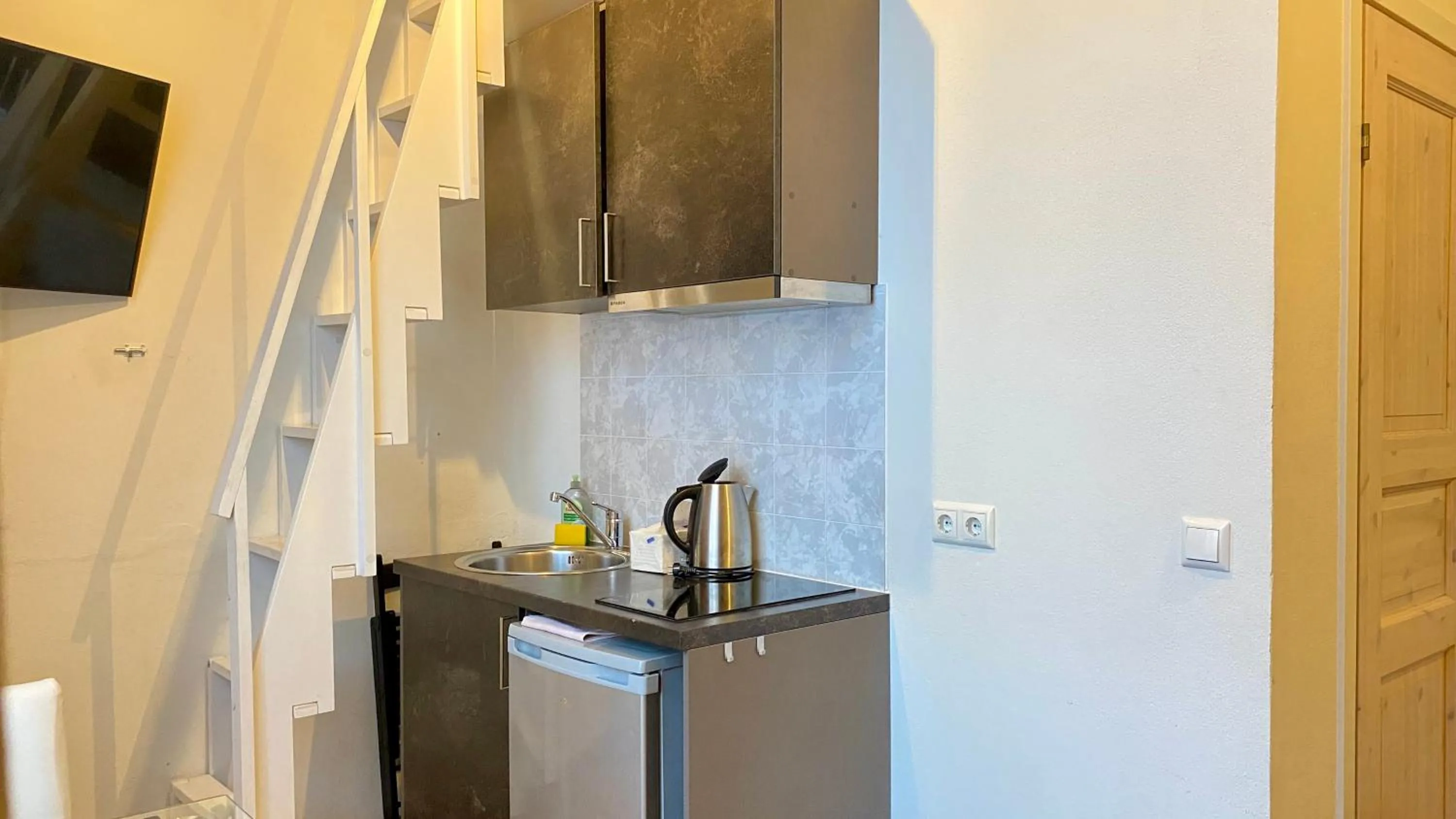 Kitchen or kitchenette in Filosoofi 1 Studio Apartments