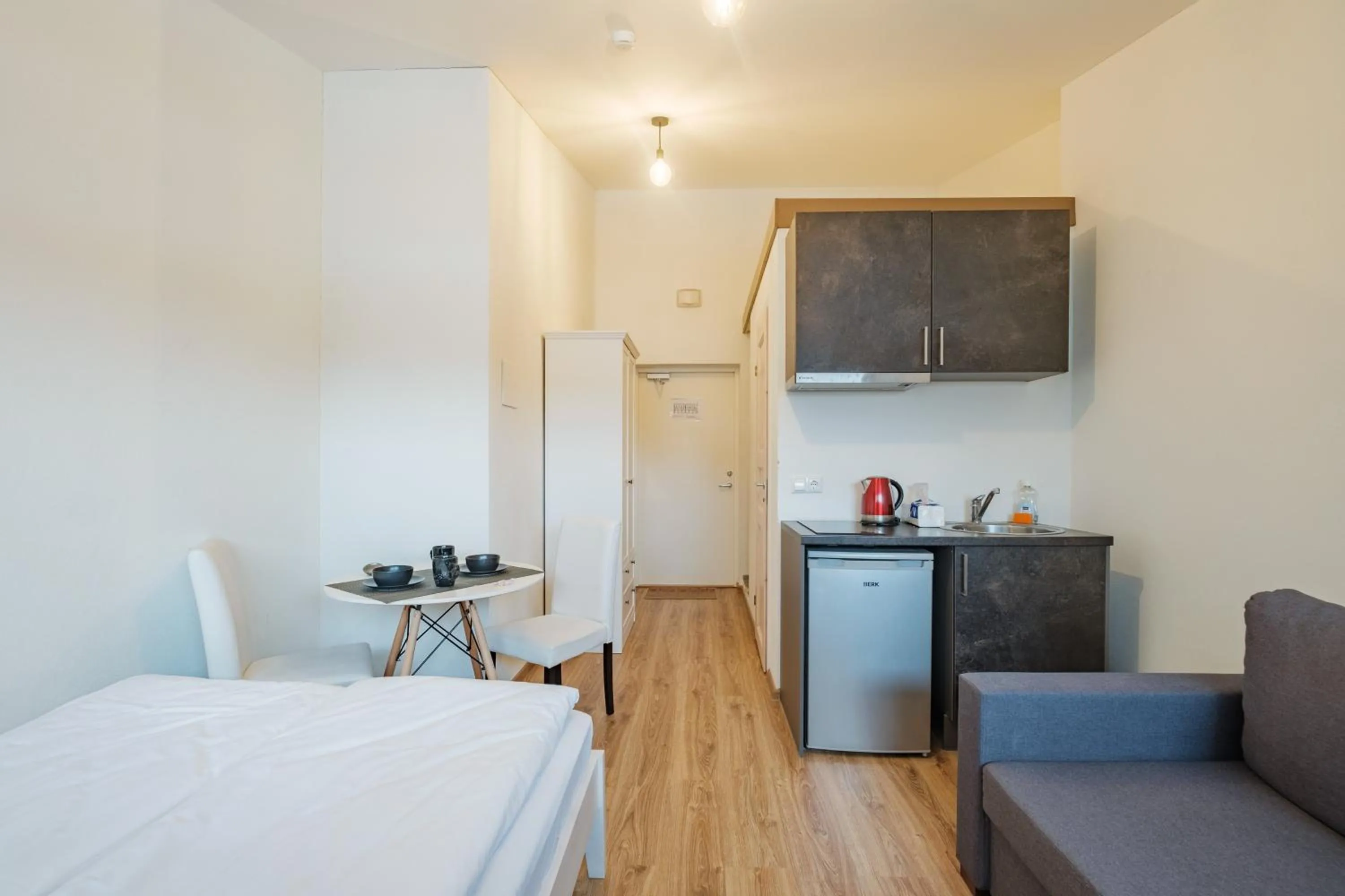 Kitchen or kitchenette, Bed in Filosoofi 1 Studio Apartments